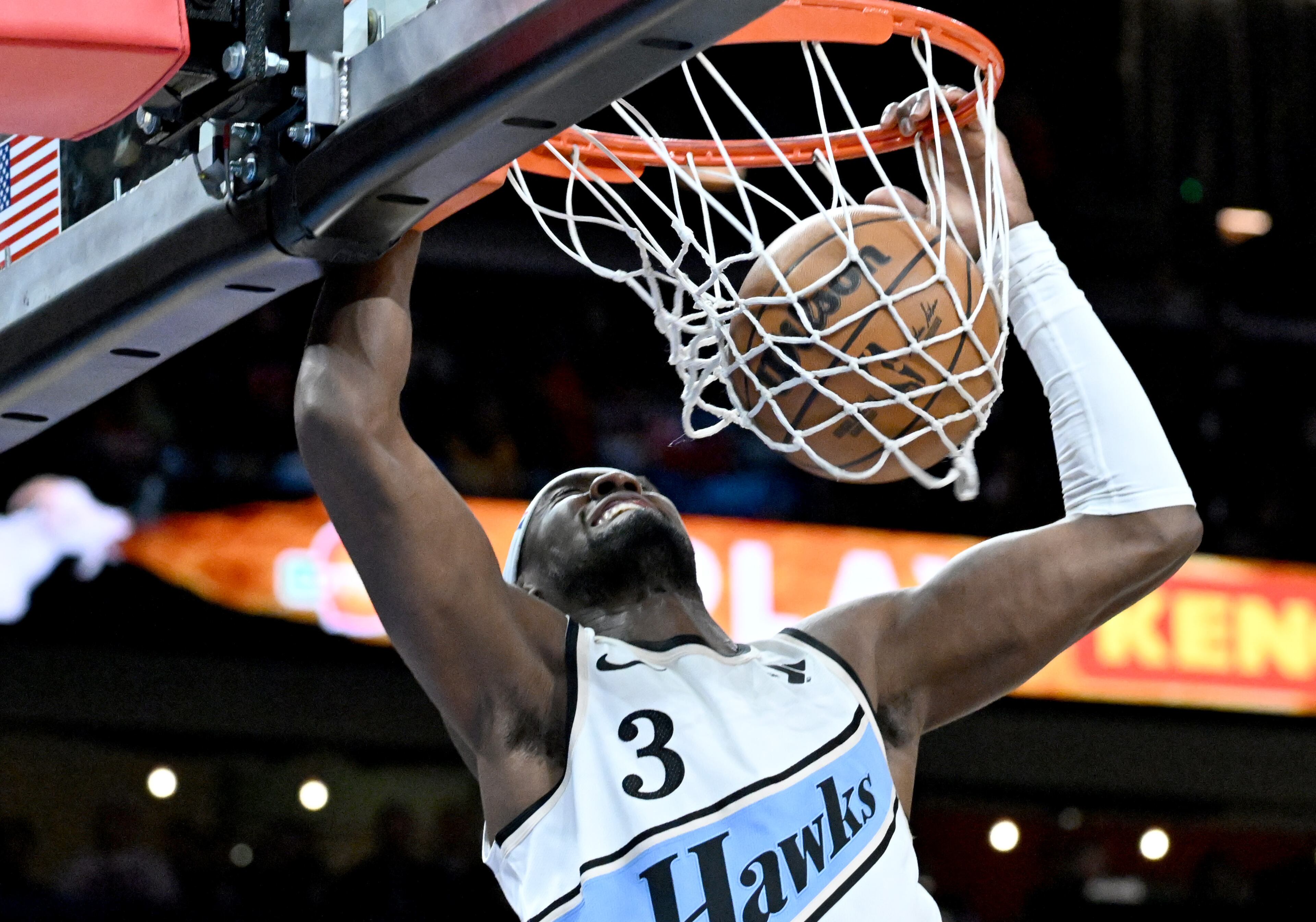 Atlanta Hawks guard Caris LeVert (3) dunks the ball during the first half in an NBA basketball game at State Farm Arena, Friday, February 28, 2025, in Atlanta. (Hyosub Shin / AJC)