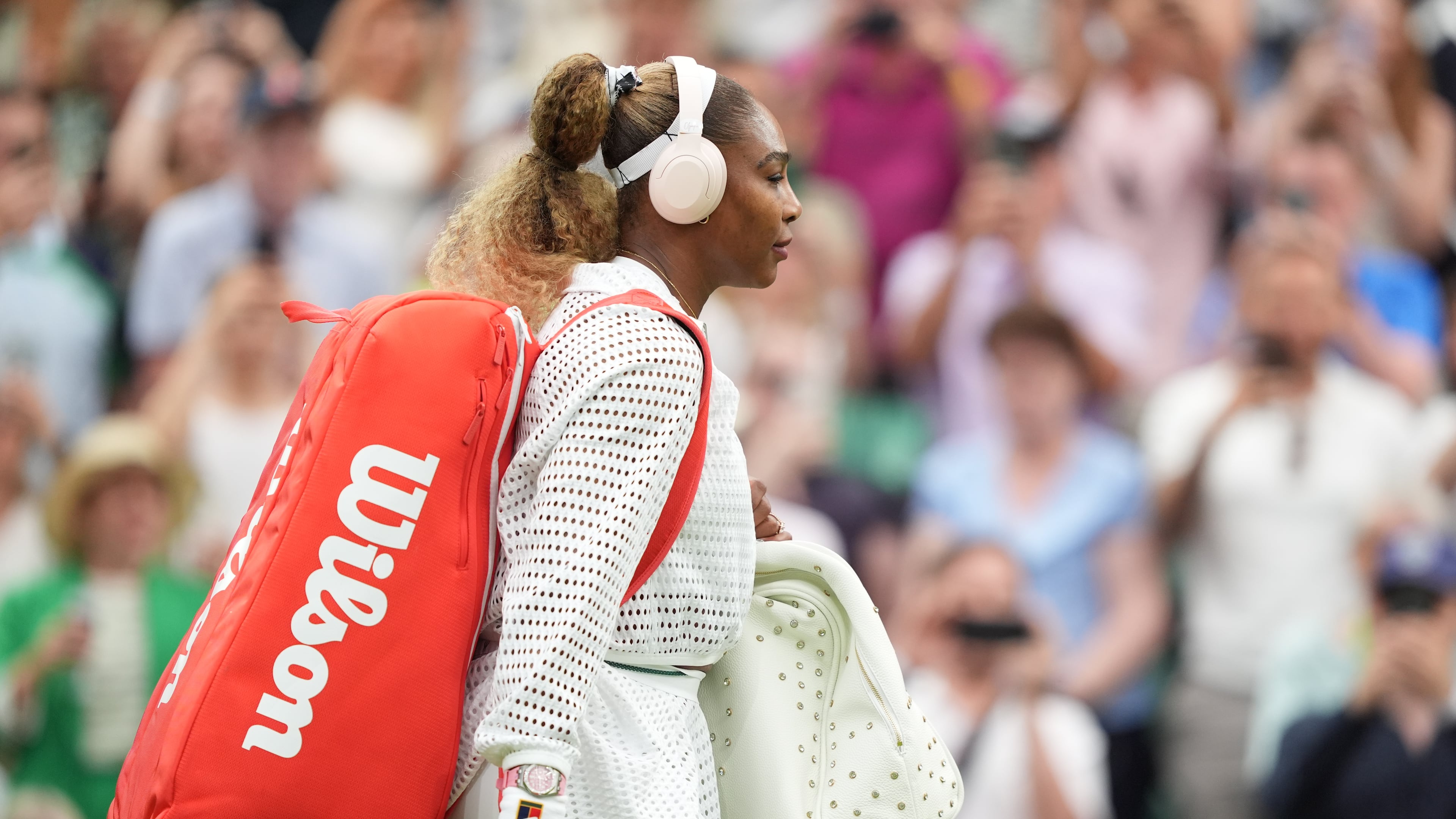 Serena Williams of the United States enters the centre court to play against Maya Joint of Australia in their first round women's singles match at the Wimbledon Tennis Championships in London, Tuesday, June 30, 2026. (AP Photo/Maja Smiejkowska)