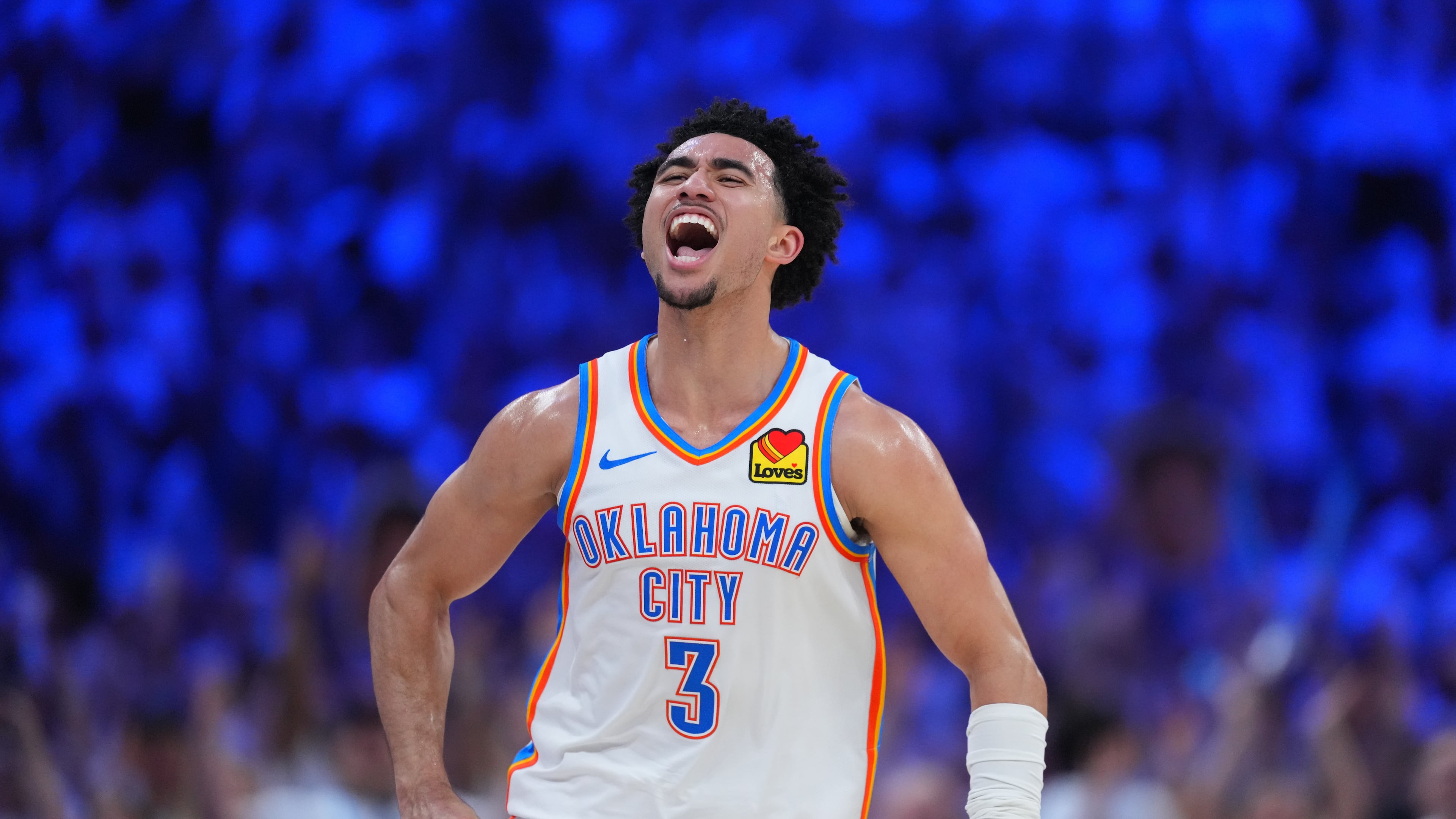 Oklahoma City Thunder guard Jared McCain (3) reacts to a basket against the San Antonio Spurs in the second half of Game 5 in the Western Conference finals NBA basketball playoffs series, Tuesday, May 26, 2026, in Oklahoma City. (AP Photo/Julio Cortez)