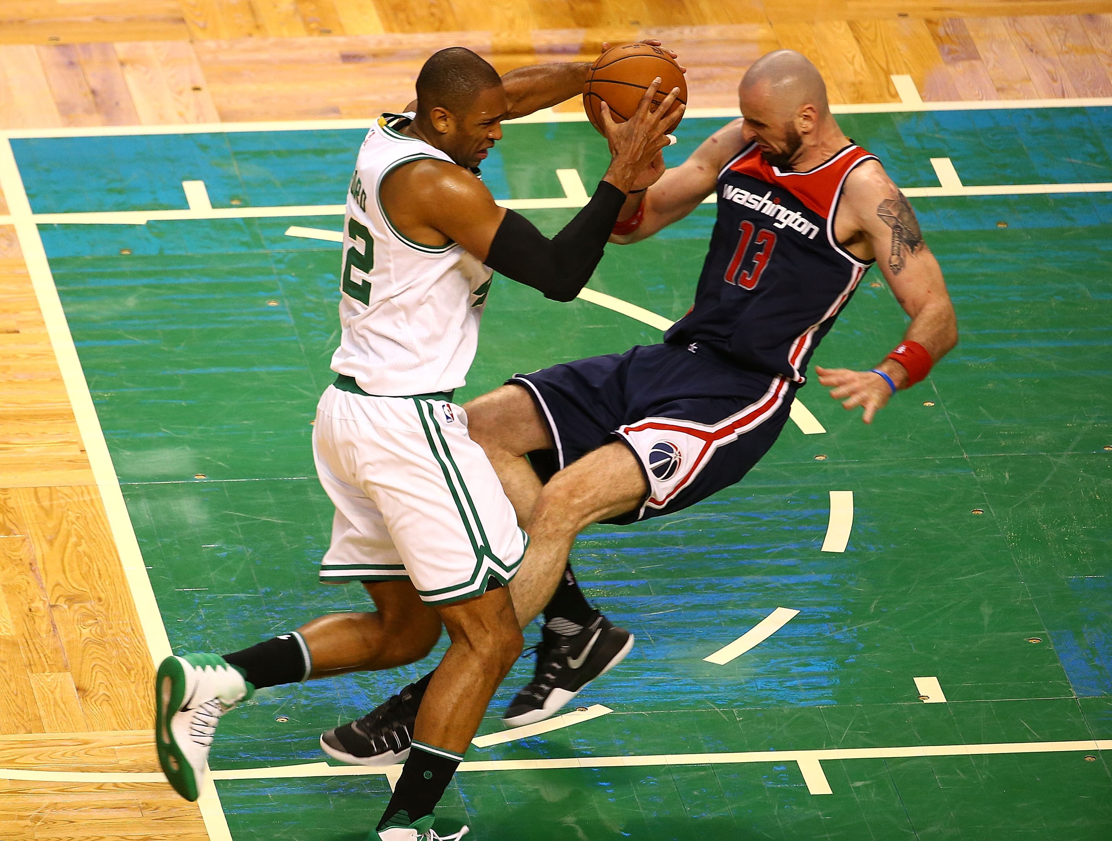BOSTON, MA - MAY 15: Al Horford #42 of the Boston Celtics drives against Marcin Gortat #13 of the Washington Wizards during Game Seven of the NBA Eastern Conference Semi-Finals at TD Garden on May 15, 2017 in Boston, Massachusetts. NOTE TO USER: User expressly acknowledges and agrees that, by downloading and or using this photograph, User is consenting to the terms and conditions of the Getty Images License Agreement. (Photo by Adam Glanzman/Getty Images)