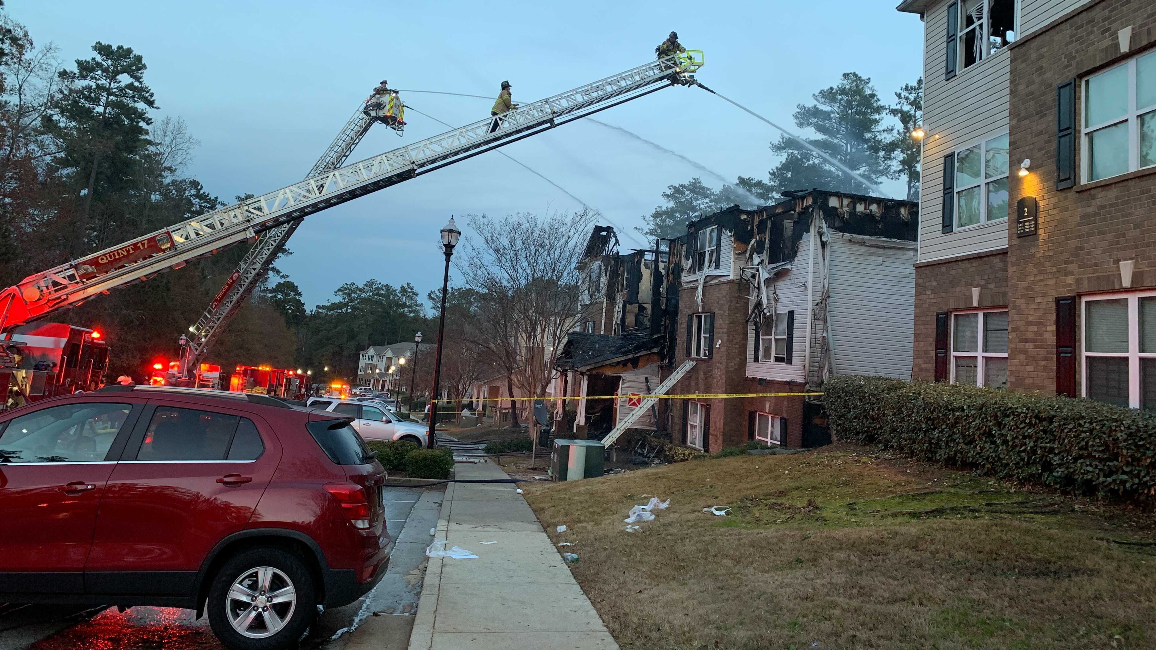 Eighteen residents, including children, were injured Friday afternoon in a fire at a DeKalb County apartment complex, authorities said.