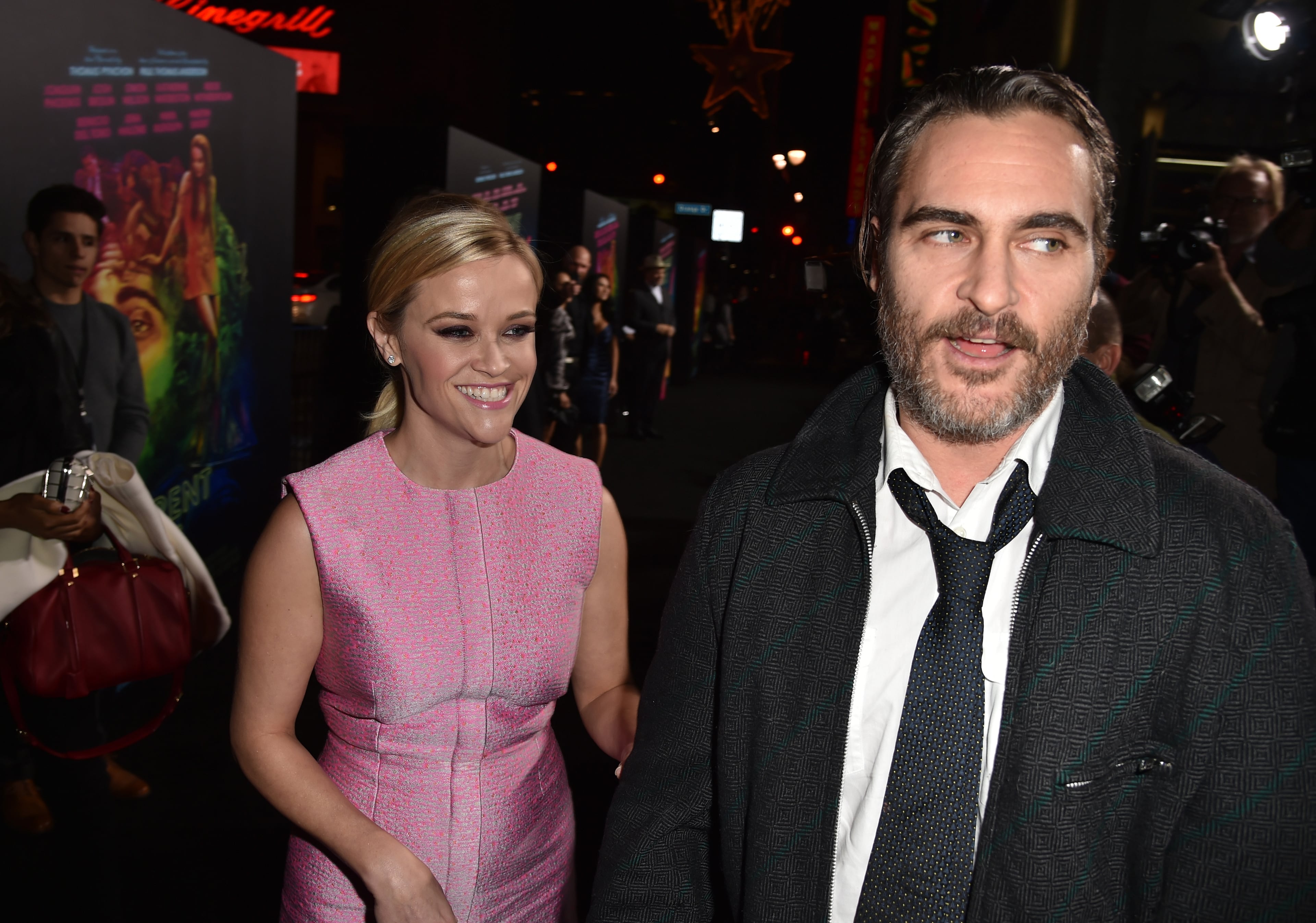 HOLLYWOOD, CA - DECEMBER 10: Actors Reese Witherspoon (L) and Joaquin Phoenix attend the premiere of Warner Bros. Pictures' "Inherent Vice" at TCL Chinese Theatre on December 10, 2014 in Hollywood, California. (Photo by Kevin Winter/Getty Images)