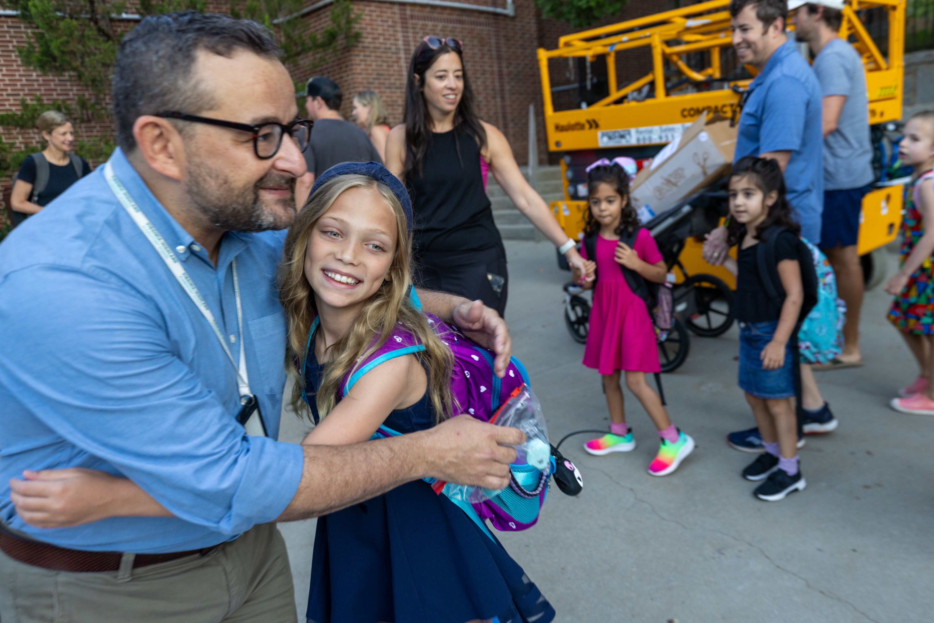 Virginia-Highland Elementary Principal Terry Harness greets parents and students on the first day of school, Tuesday, August 1, 2023. (Steve Schaefer/steve.schaefer@ajc.com)