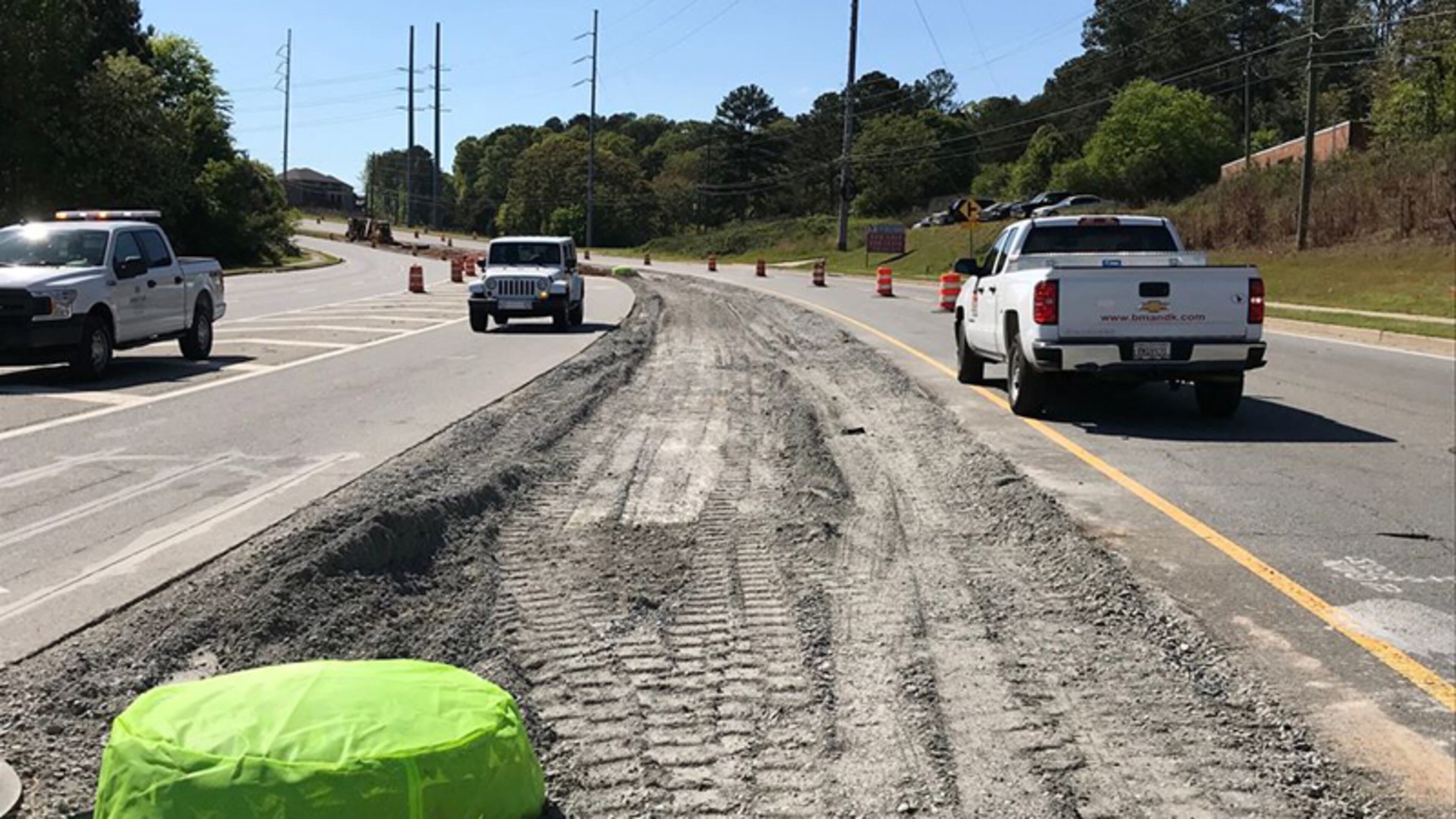Improvements to the intersection of Bell and McGinnis Ferry roads in Johns Creek continue with the installation of curbs and gutters. CITY OF JOHNS CREEK