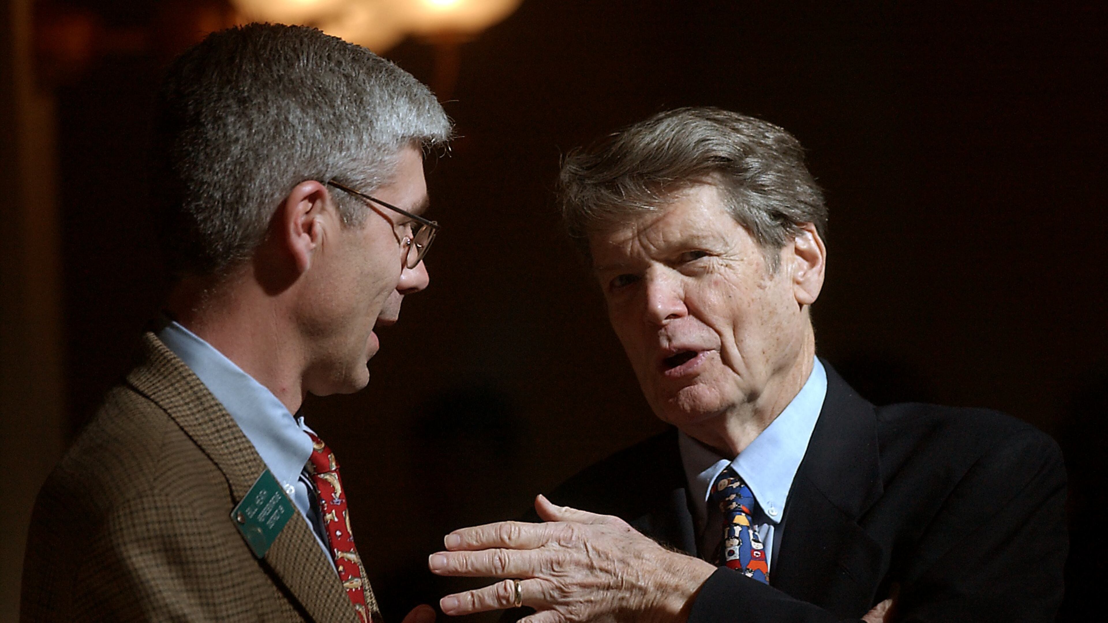 The always immaculately dressed and well-coifed Capitol lobbyist Abit Massey (right) buttonholed then-Rep. Bill Health outside of the House chamber in this 2004 photo. Massey helped grow the Georgia poultry industry into a multi-billion dollar business in Georgia. (BEN GRAY/STAFF
