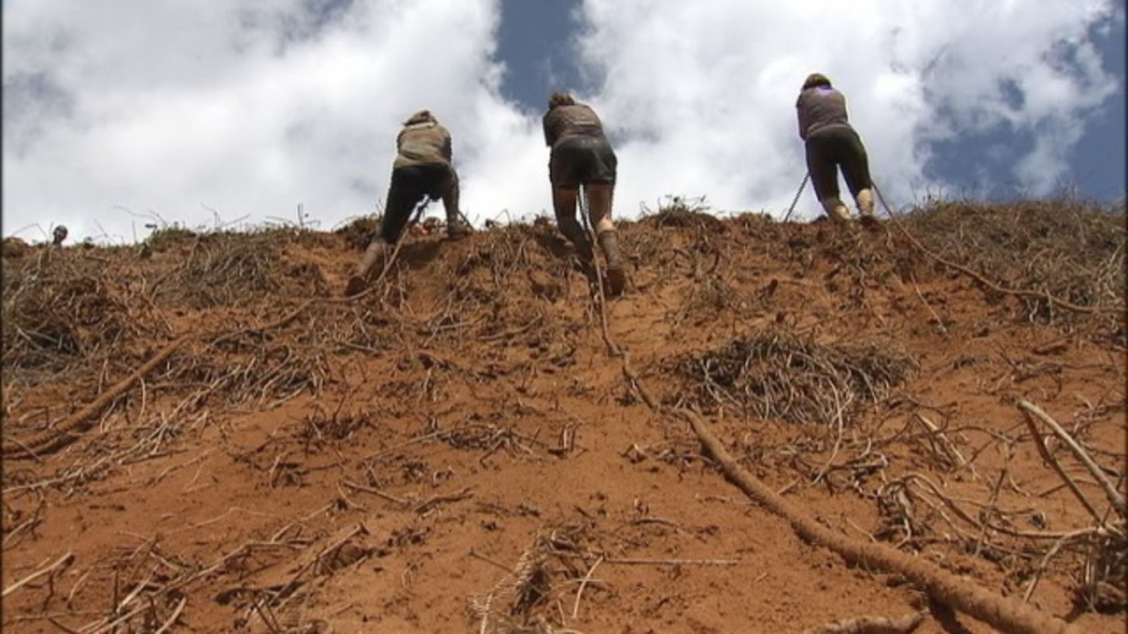 Runners battled mud, fire and barbed wire to compete in the Spartan Race at the National Whitewater Center in Charlotte.