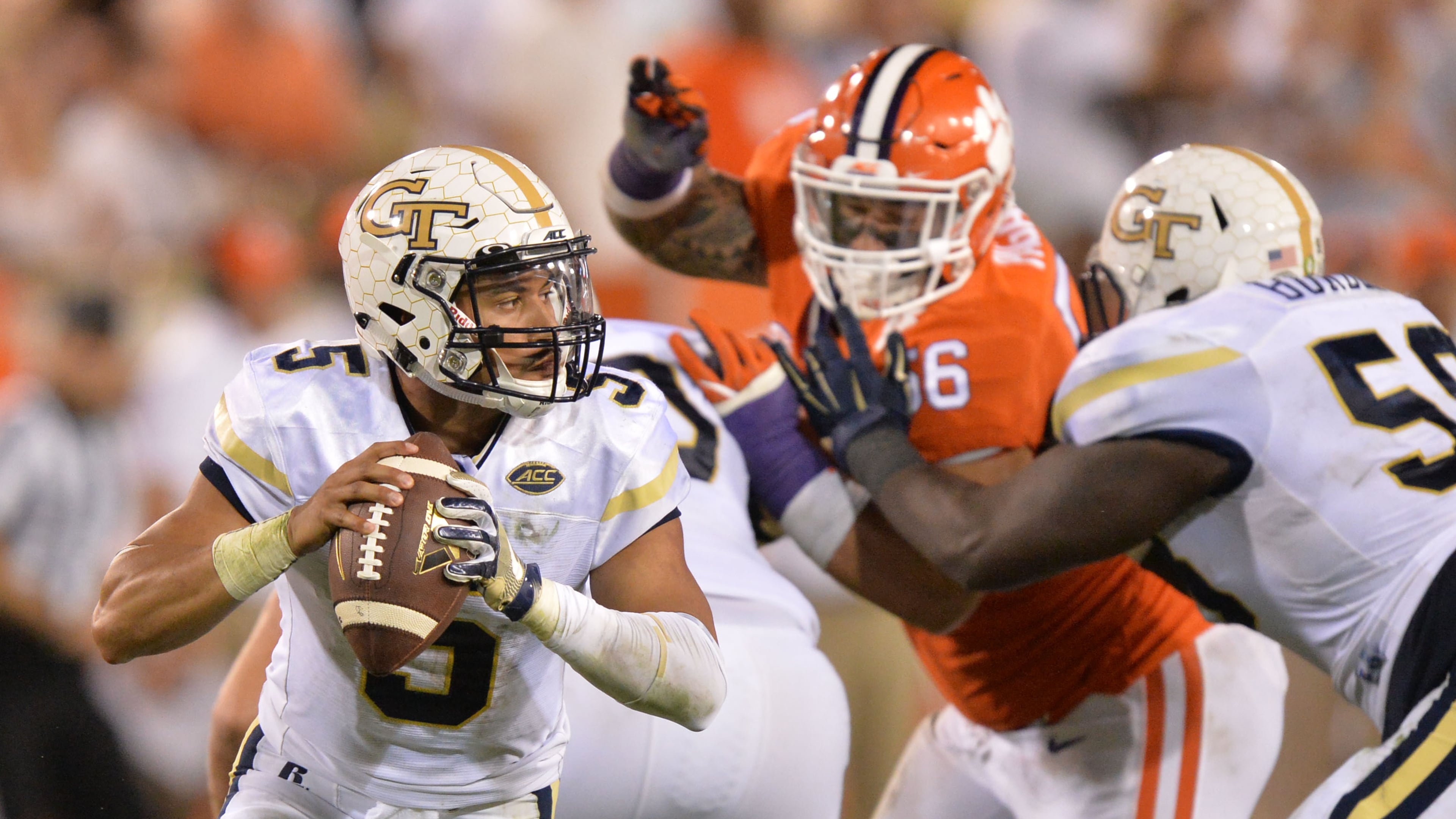 September 22, 2016 Atlanta - Georgia Tech Yellow Jackets quarterback Justin Thomas (5) looks for a space for a pass in the second half at Bobby Dodd Stadium on Thursday, September 22, 2016. Clemson Tigers won 26 - 7 over the Georgia Tech Yellow Jackets. HYOSUB SHIN / HSHIN@AJC.COM