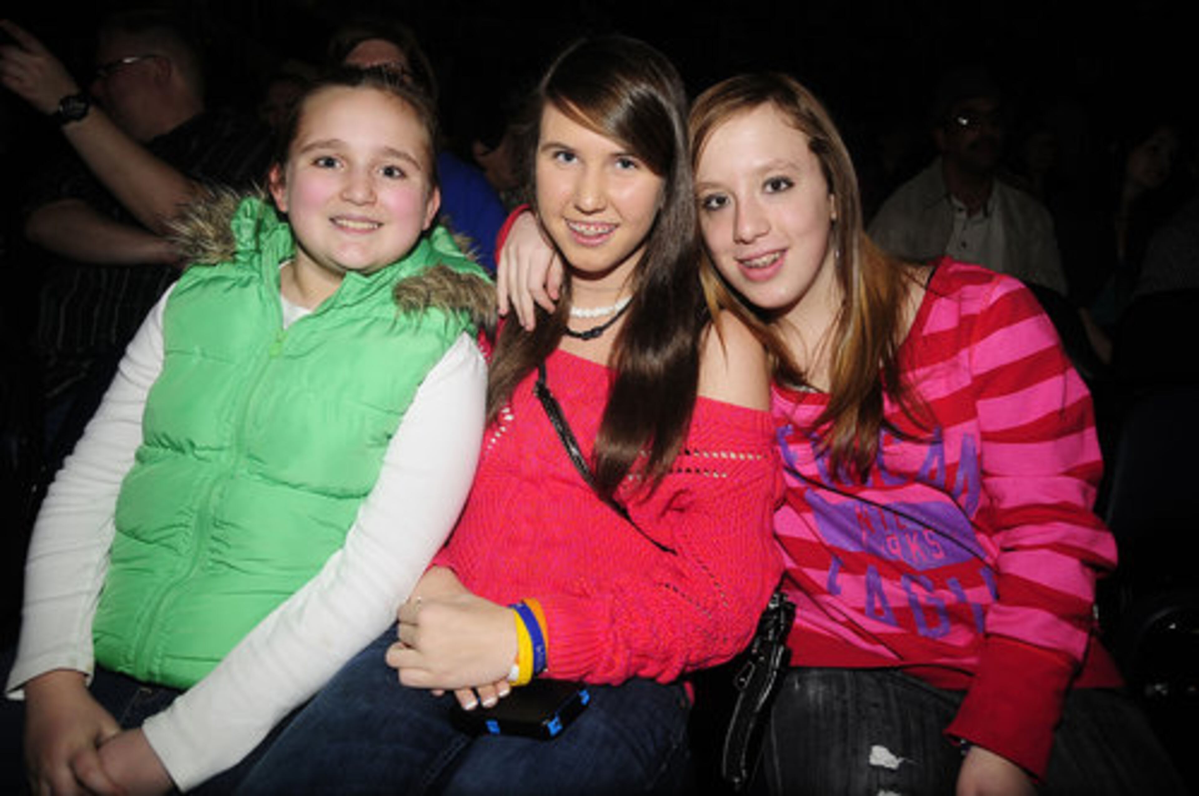 Colbi Ballard, Lexy Wallraven and Katlyn Pillow await a night of laughter.