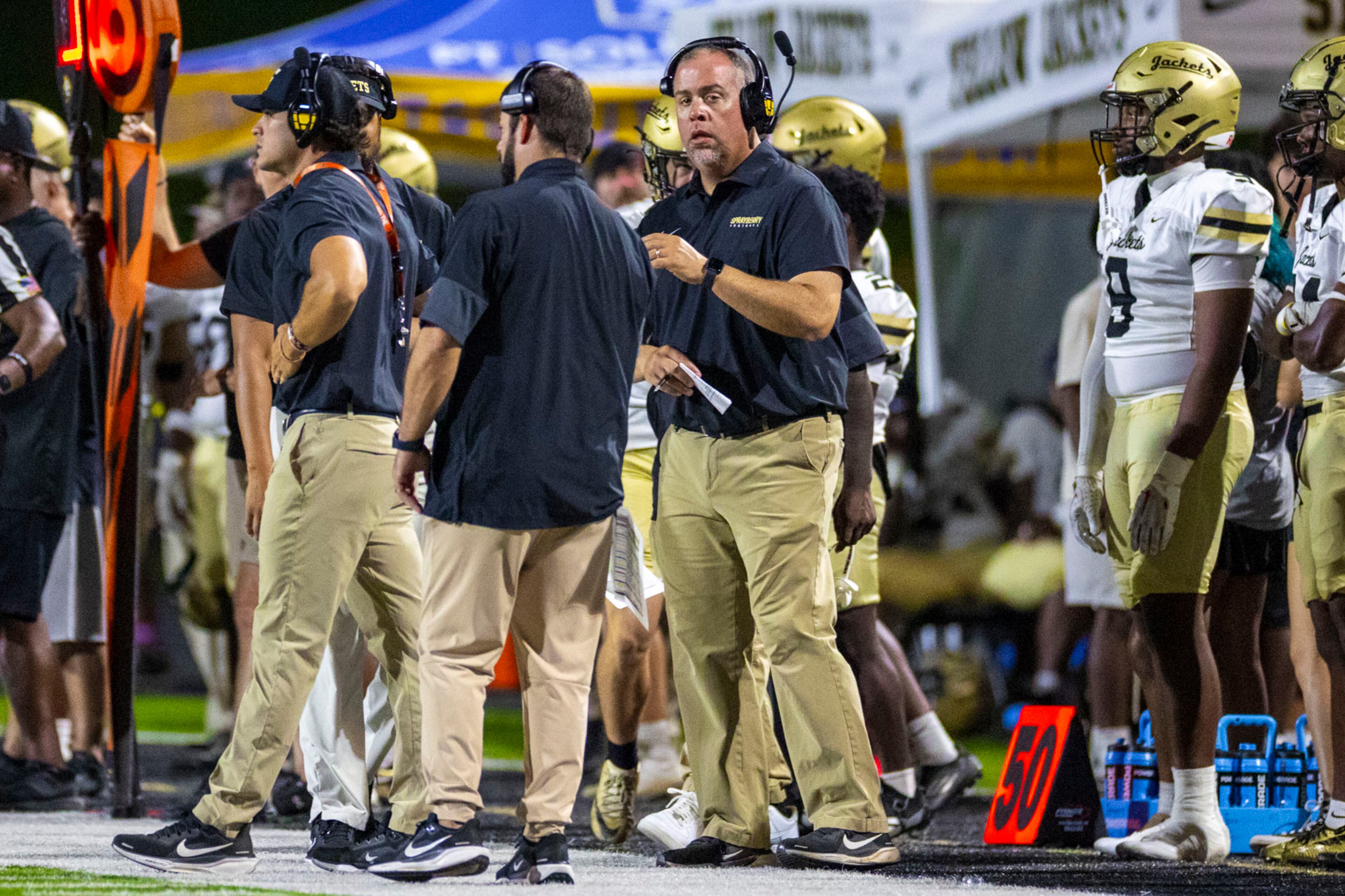 Sprayberry coach Pete Fominaya follows the game from the sidelines during the second half against Sequoyah. (Oscar Guevara Saenz for the AJC)