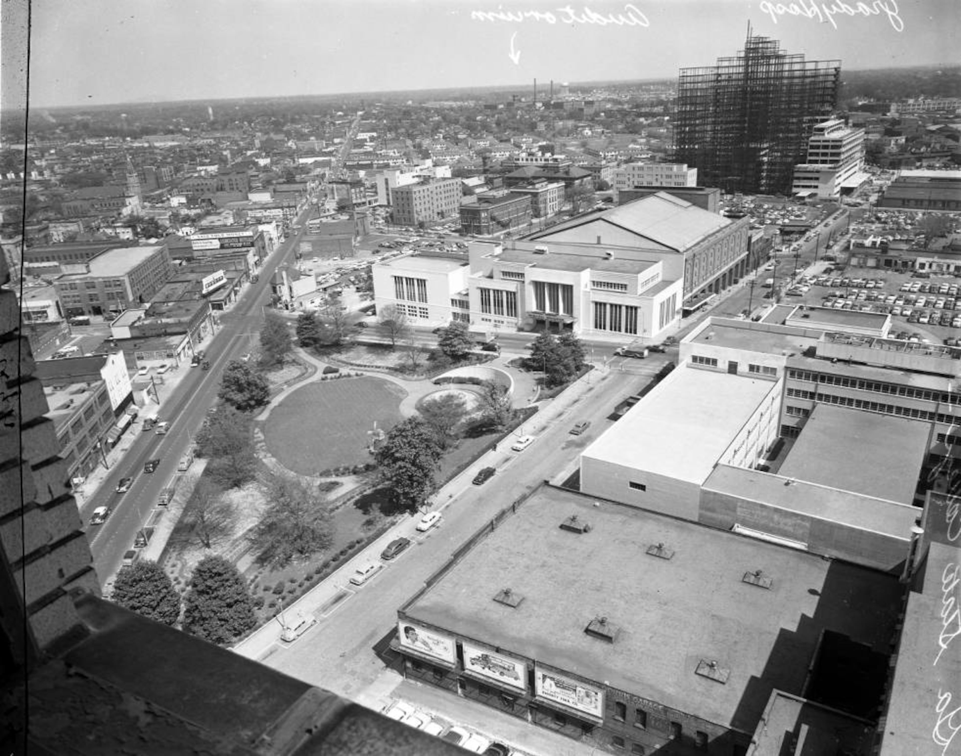 In this photo taken from the Hurt Building in April 1955, the building in the center is the Municipal Auditorium (now known as Georgia State Universityâs Dahlberg Hall, located at Gilmer and Courtland). Back behind that building, you can see Grady Hospital being built.