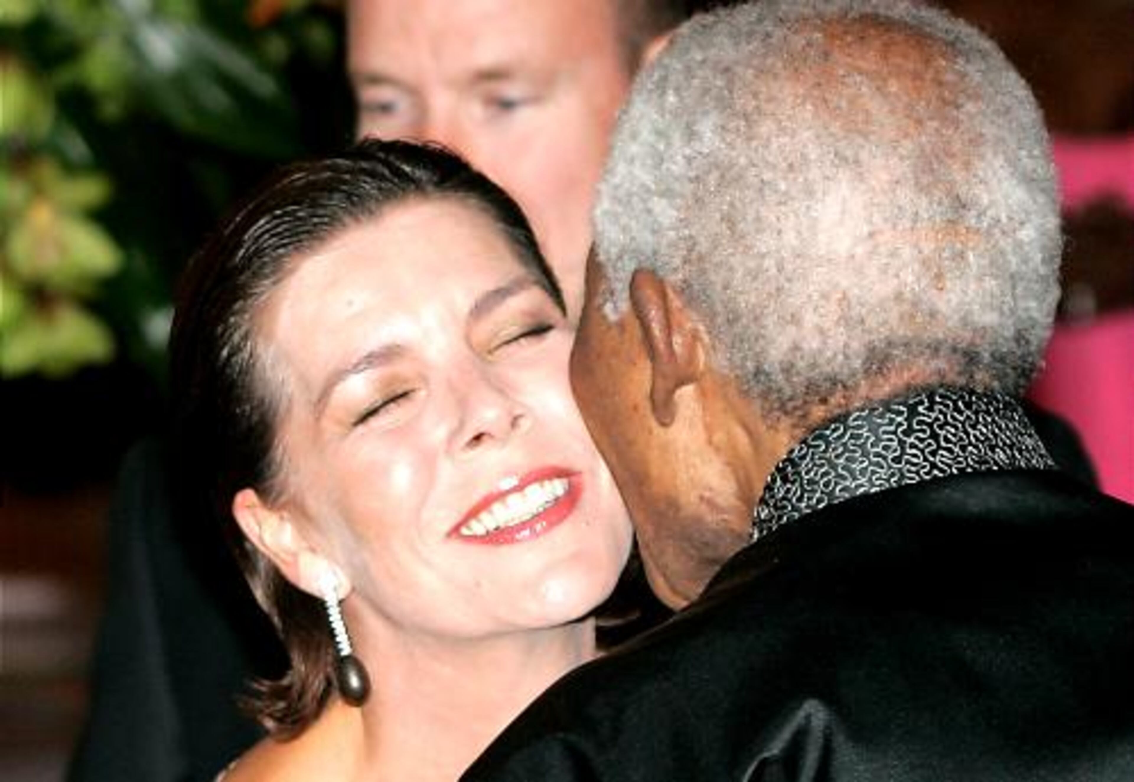 Princess Caroline greets Nelson Mandela at the Sotheby's soiree.