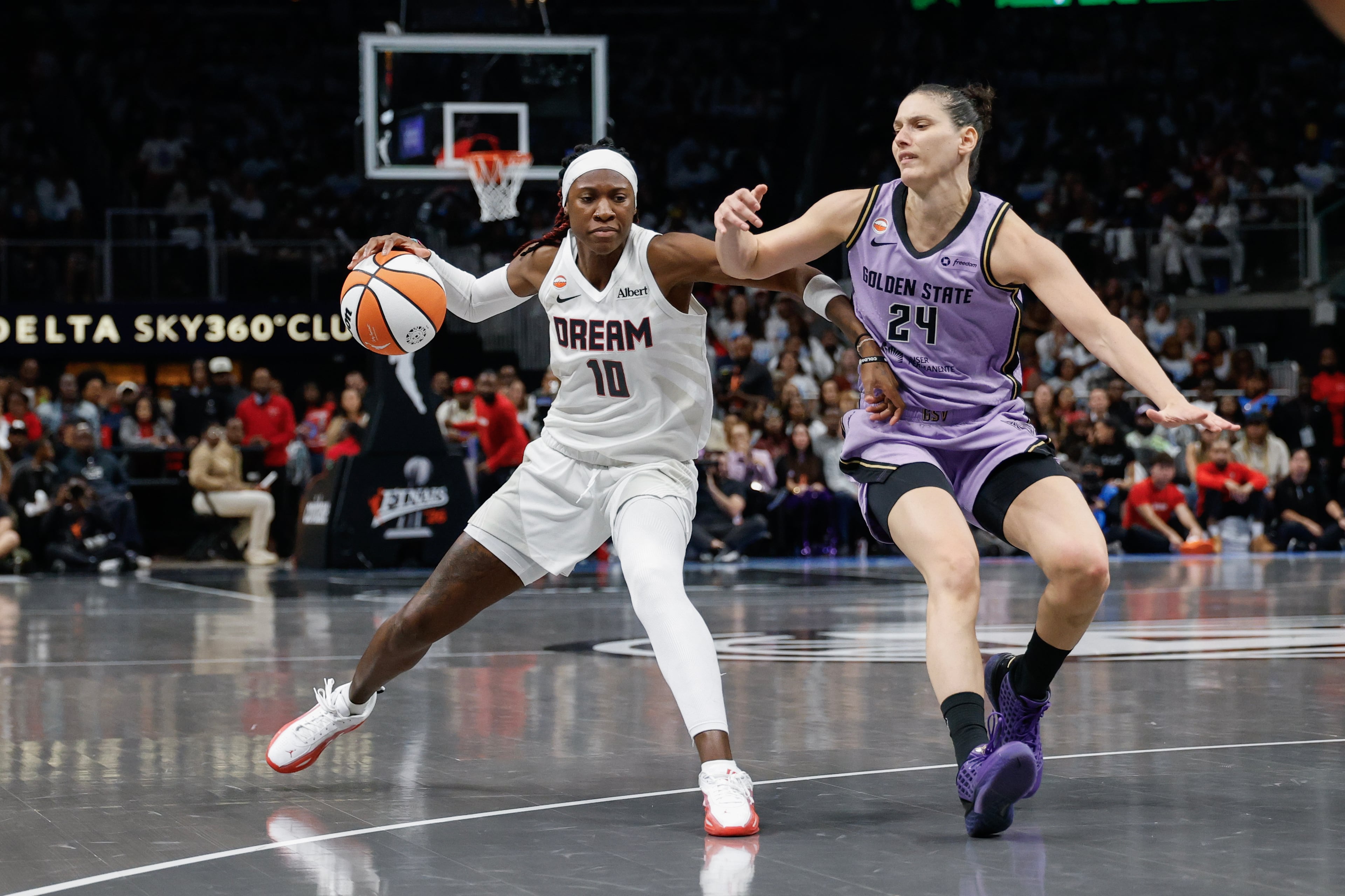 Atlanta Dream guard Rhyne Howard drives against Golden State Valkyries forward Cecilia Zandalasini during the second half of Game 4 of the WNBA Finals between the Atlanta Dream and the Golden State Valkyries, Saturday, Oct. 24, 2026, in Atlanta. (Erik S. Lesser for the AJC)