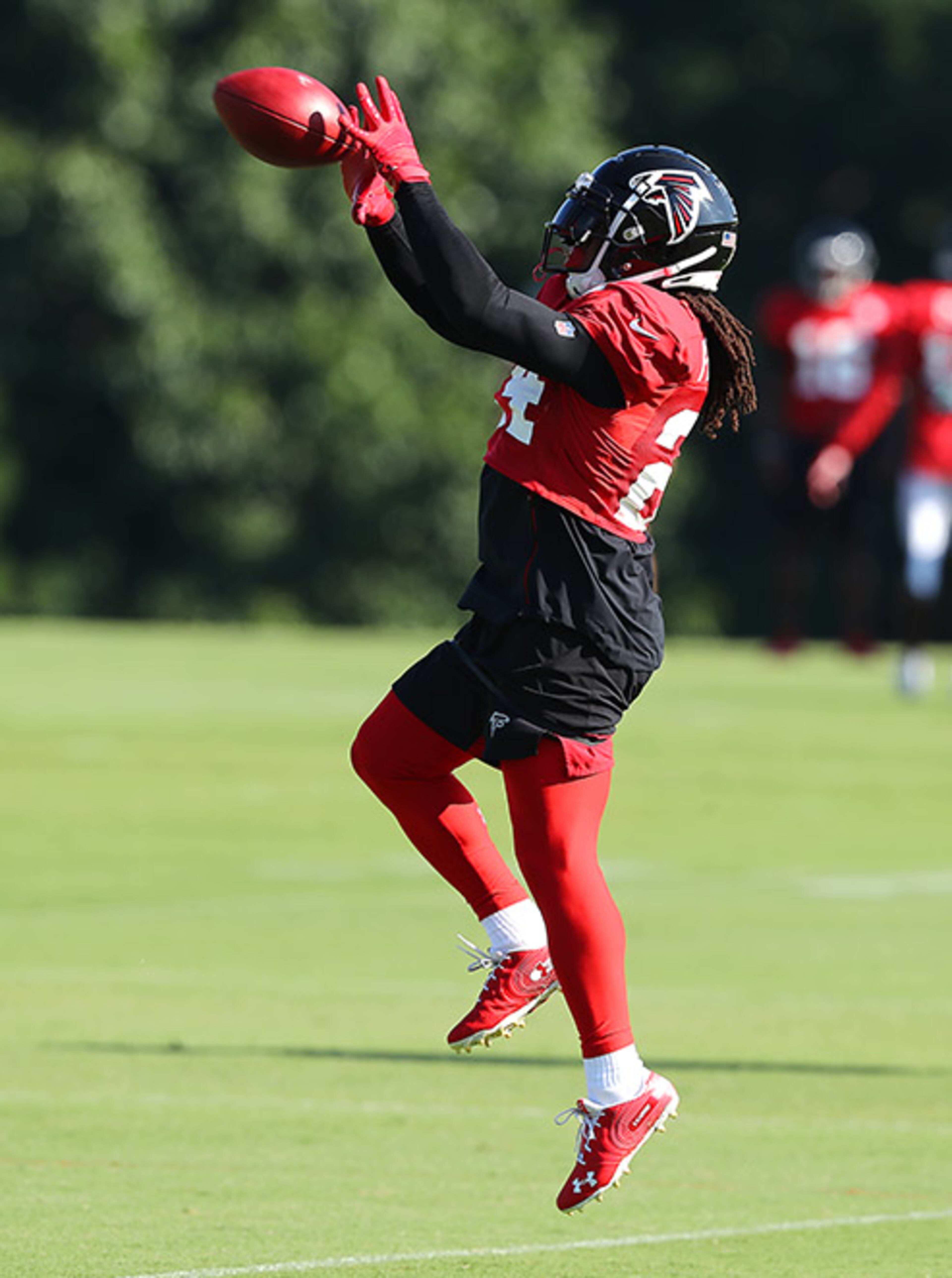 Falcons running back Devonta Freeman catches a pass during training camp practice Thursday, July 25, 2019, in Flowery Branch.