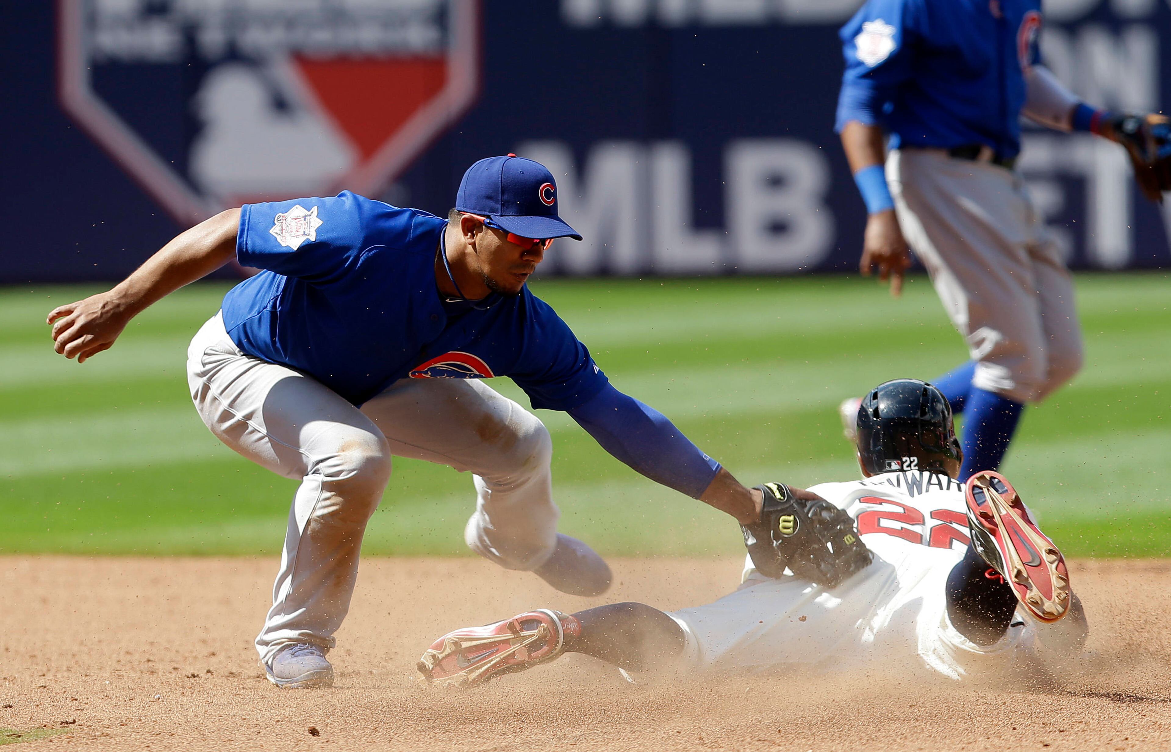 Atlanta Braves' Jason Heyward (22) is tagged out by Chicago Cubs shortstop Alberto Gonzalez while trying to steal second base in the seventh inning.