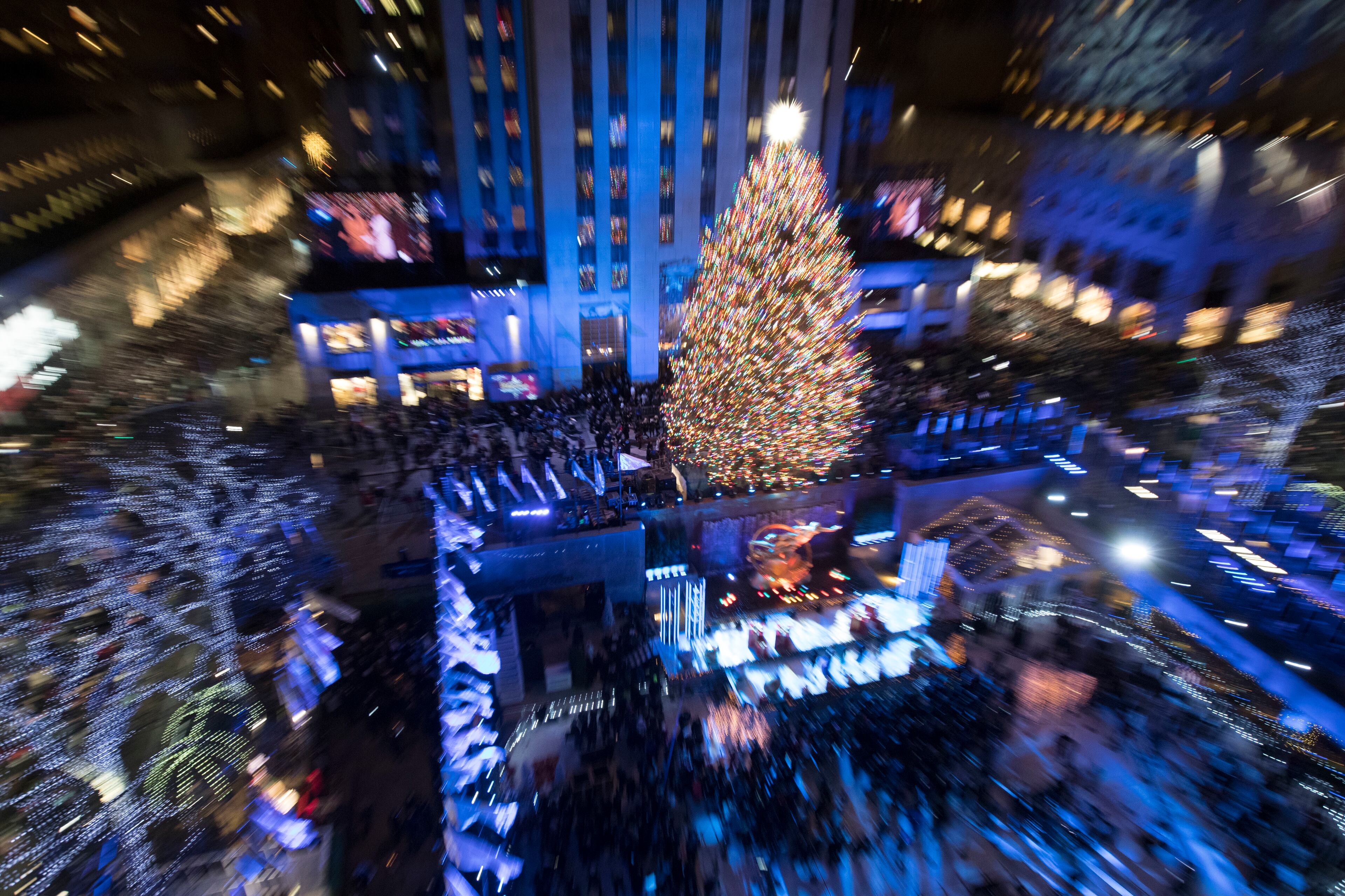 The Rockefeller Center Christmas tree is lit during the 86th annual Rockefeller Center Christmas tree lighting ceremony, Wednesday, Nov. 28, 2018, in New York. (AP Photo/Mary Altaffer)