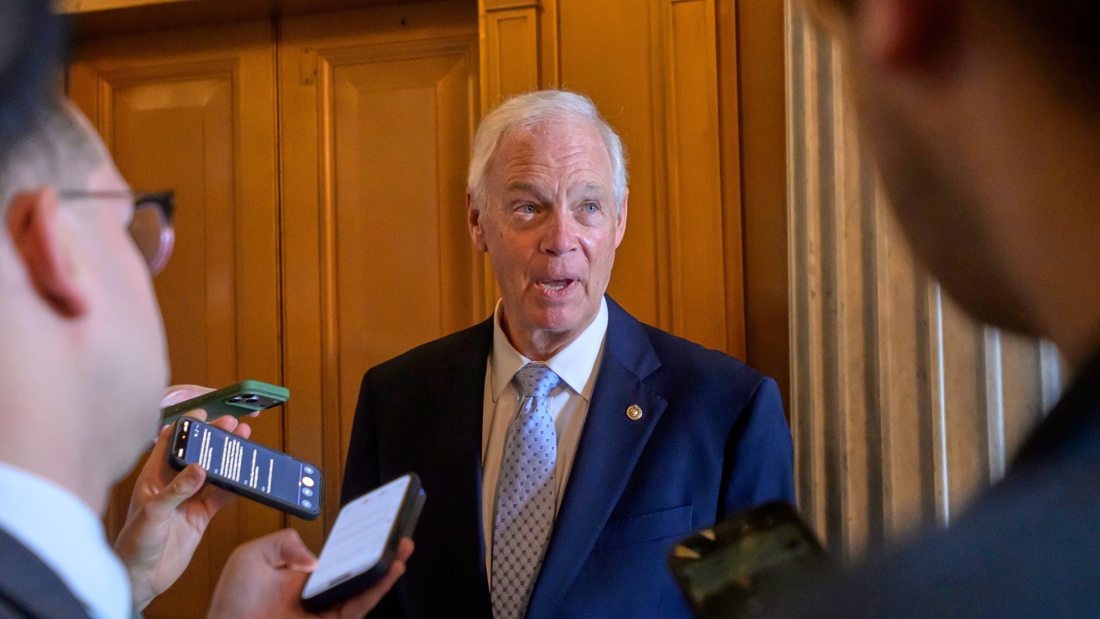 Sen. Ron Johnson, R-Wis., talks with reporters outside of the Senate chamber during a vote at the U.S. Capitol, Friday, August 7, 2026, in Washington. (AP Photo/Rod Lamkey, Jr.)