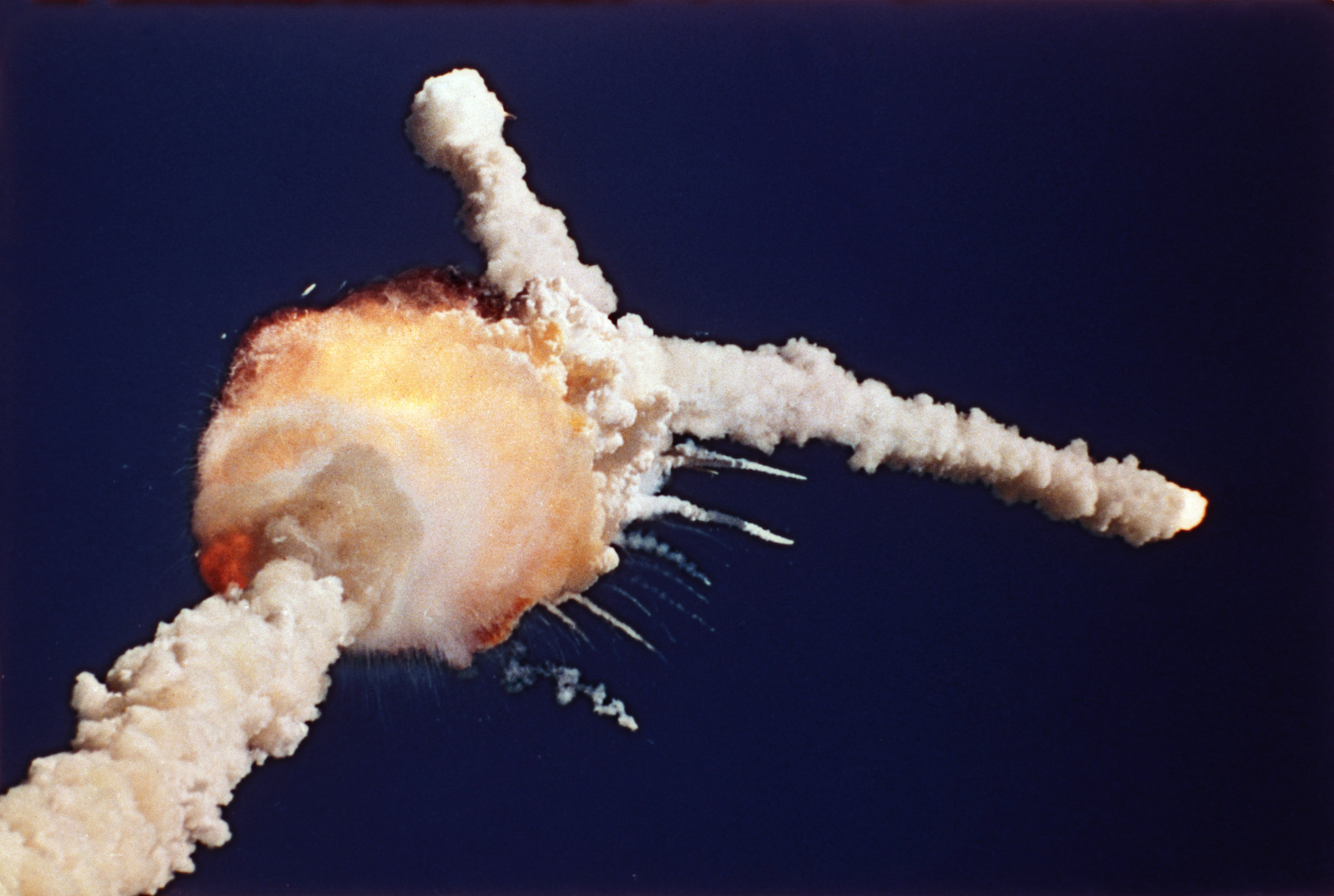 The space shuttle Challenger explodes shortly after lifting off from Kennedy Space Center in Florida on Jan. 28, 1986. (Bruce Weaver/AP)