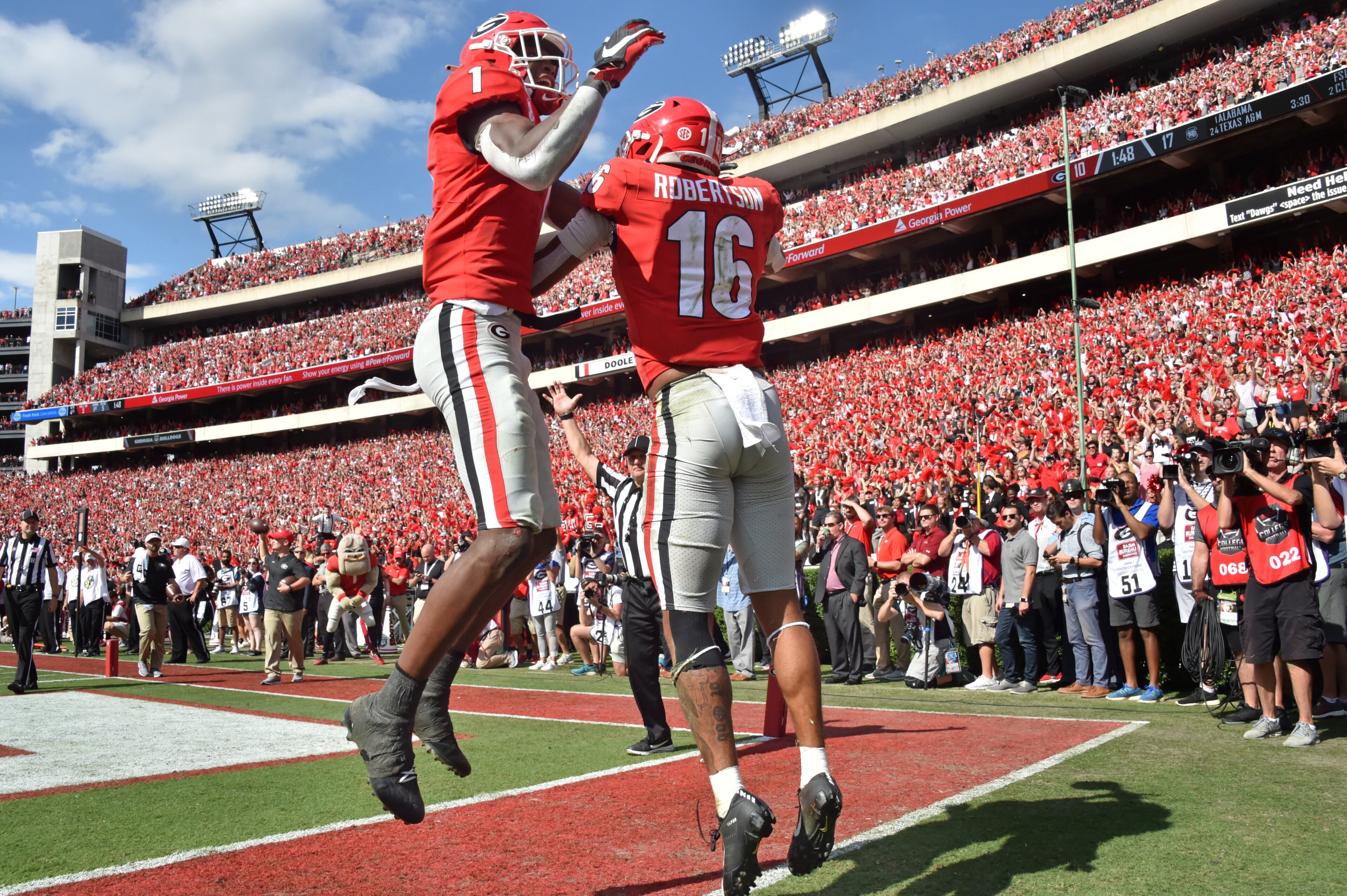 Georgia wide receivers Demetris Robertson (16) and George Pickens (1) celebrate. (Hyosub Shin / Hyosub.Shin@ajc.com)