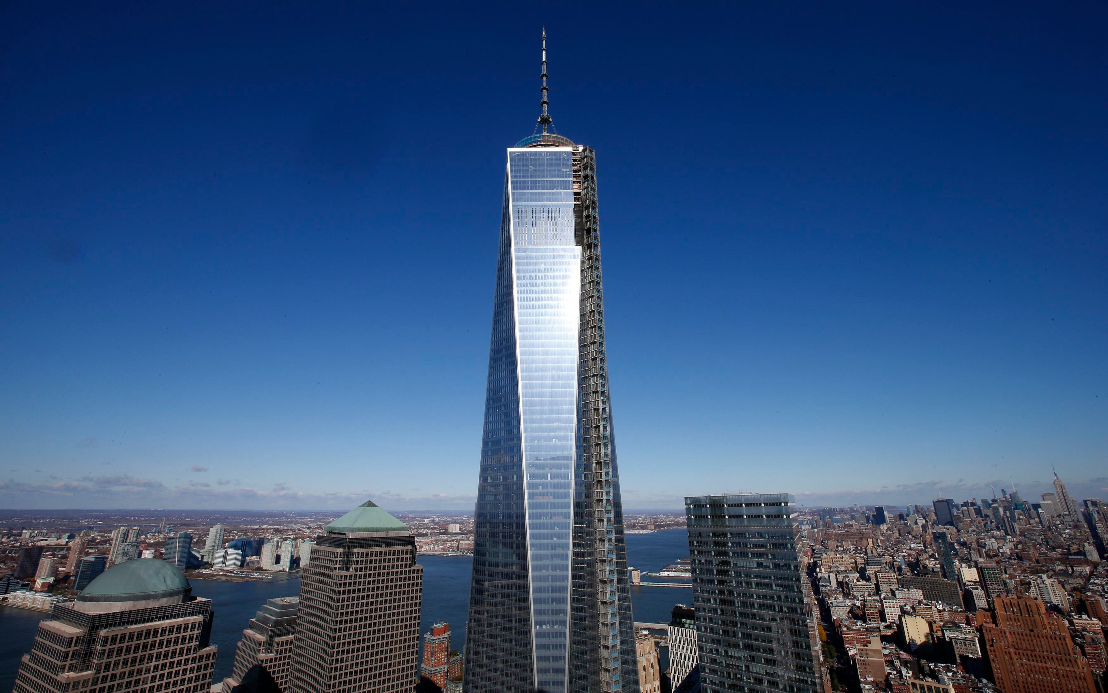 The One World Trade Center tower is seen in this picture taken from the 57th floor of the soon to be opened 4 World Trade Center tower in New York during a press tour, November 8, 2013. REUTERS/Mike Segar (UNITED STATES - Tags: BUSINESS CITYSCAPE)