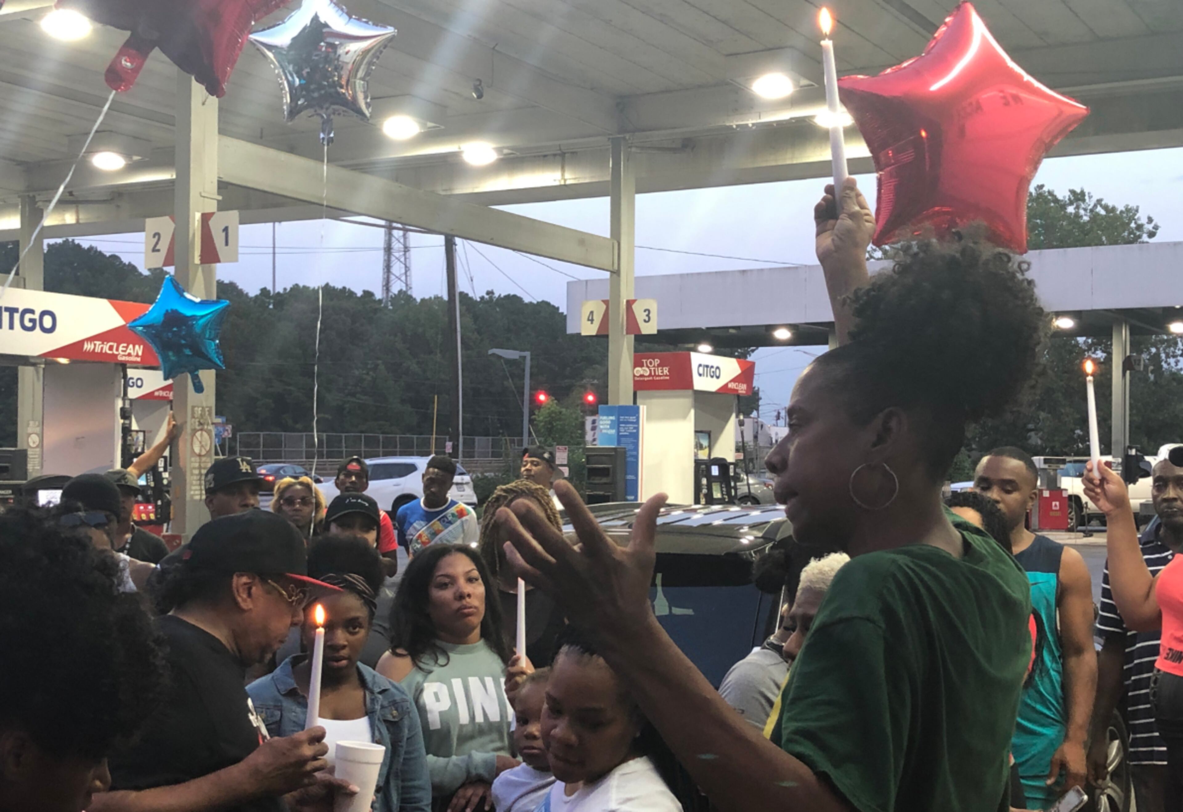 Dozens of Javon Ladson’s friends and family members showed up to a vigil to mourn the deceased father Wednesday night.