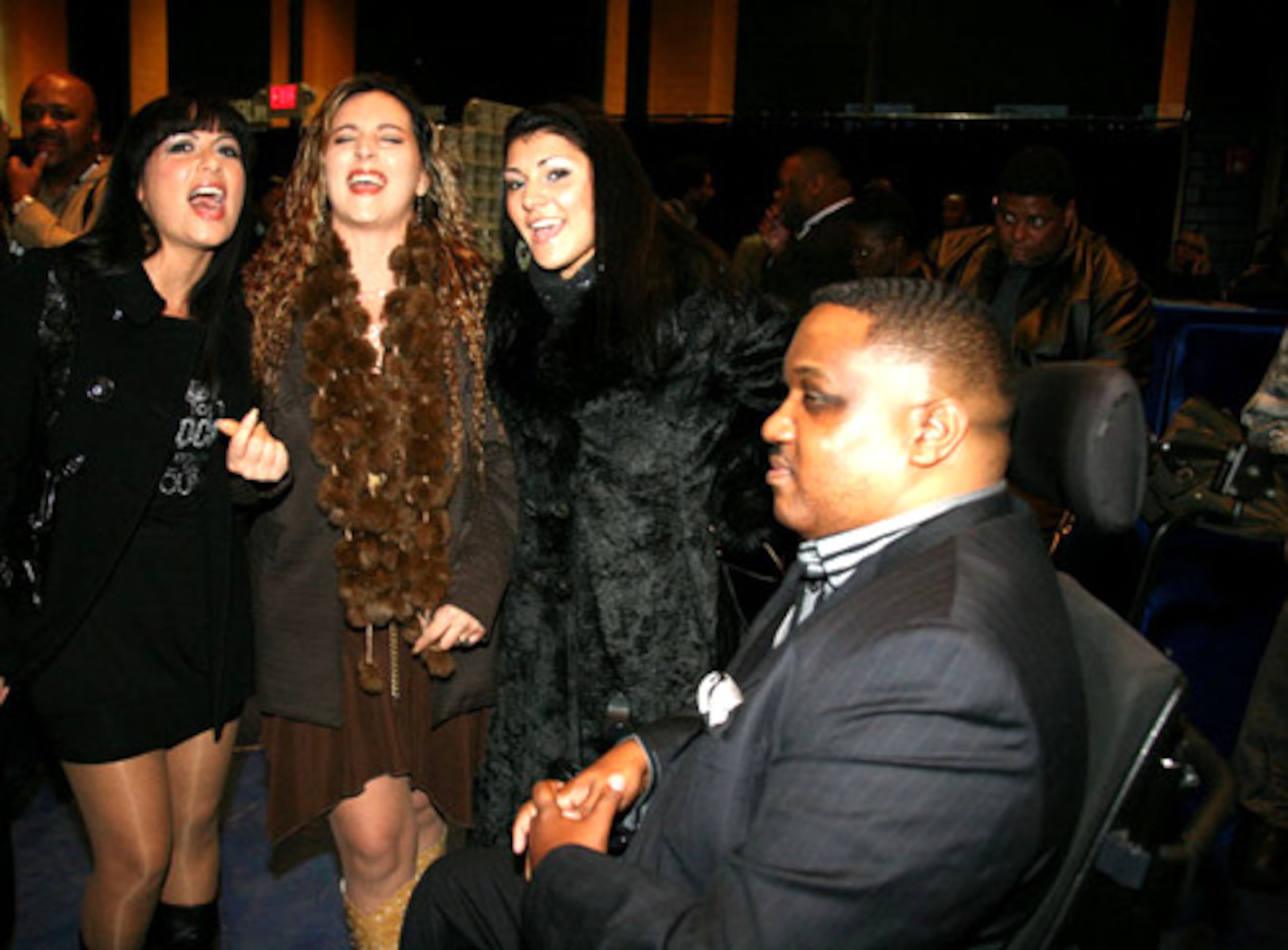 Italian R&B group Cherries serenade their manager, Perryn Oglesby.