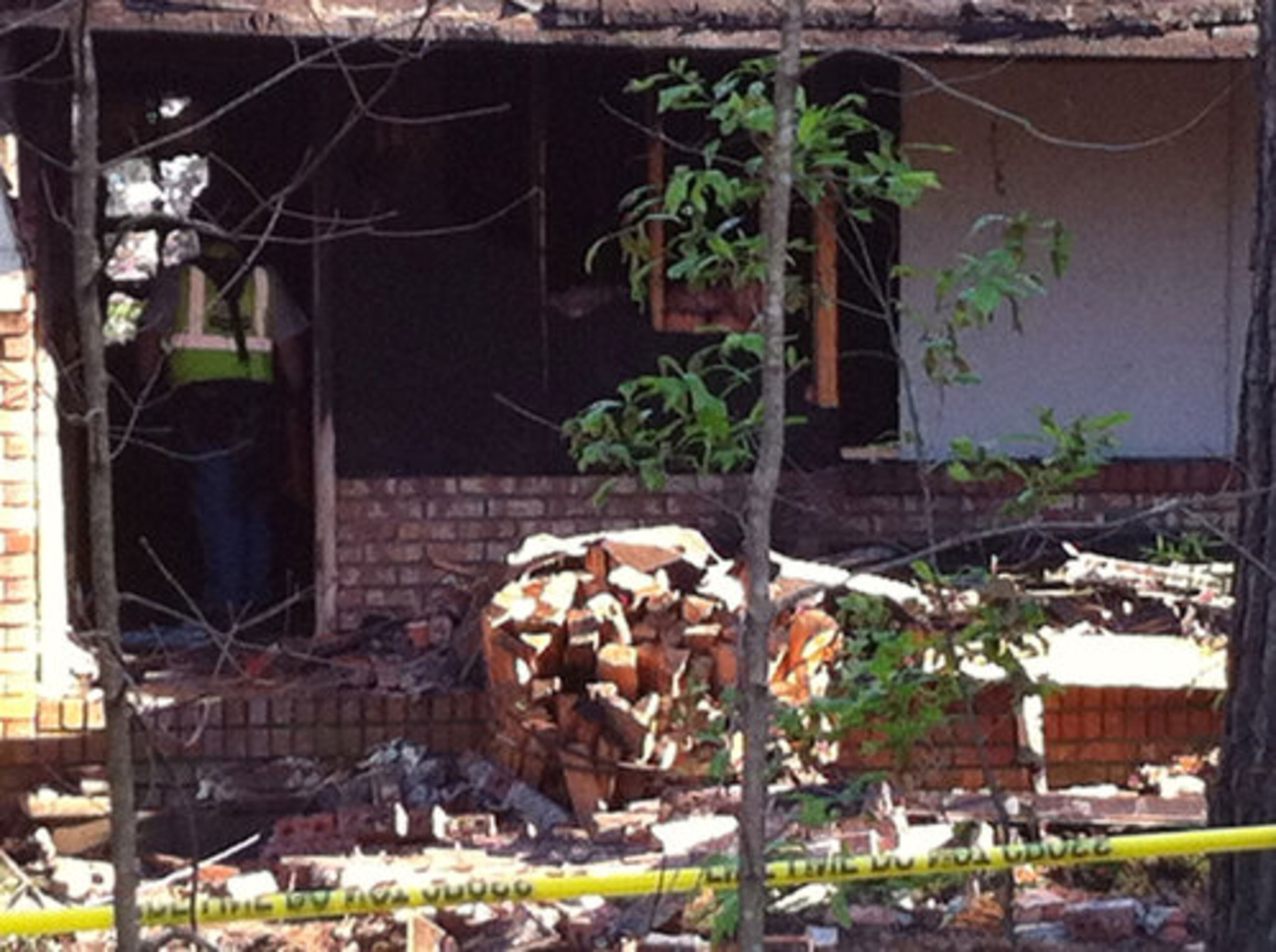 Debris is piled up outside the home of Andrew Wordes.