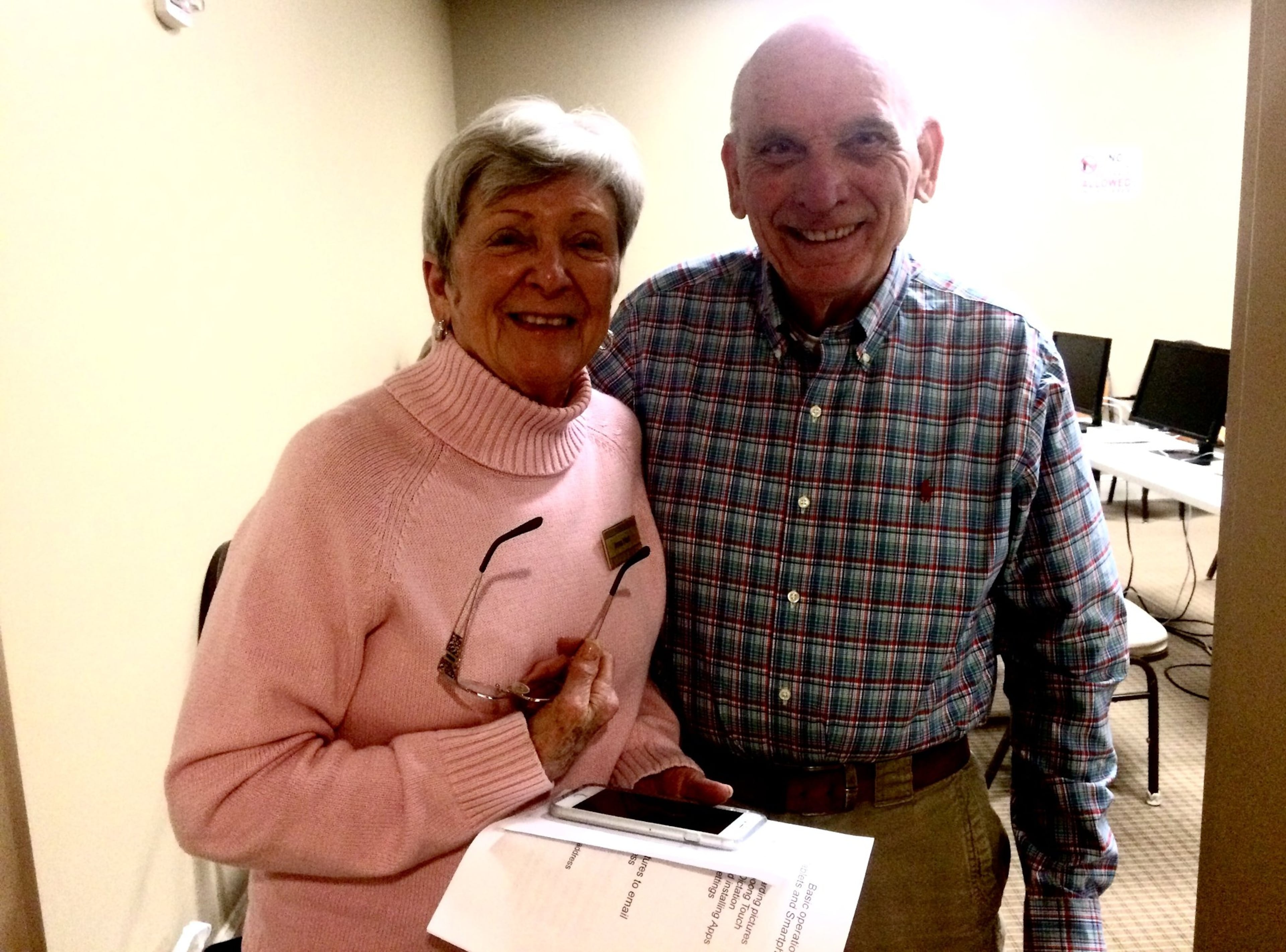Irma and Ed Hart after the class on using devices taught by Geezer Squad founder Jim Cochrane. Irma recently went from a flip phone to a smart phone at her grown children's urging, and the couple were interested in becoming more adept at using it. "We gotta stay in the loop," Ed chuckled.