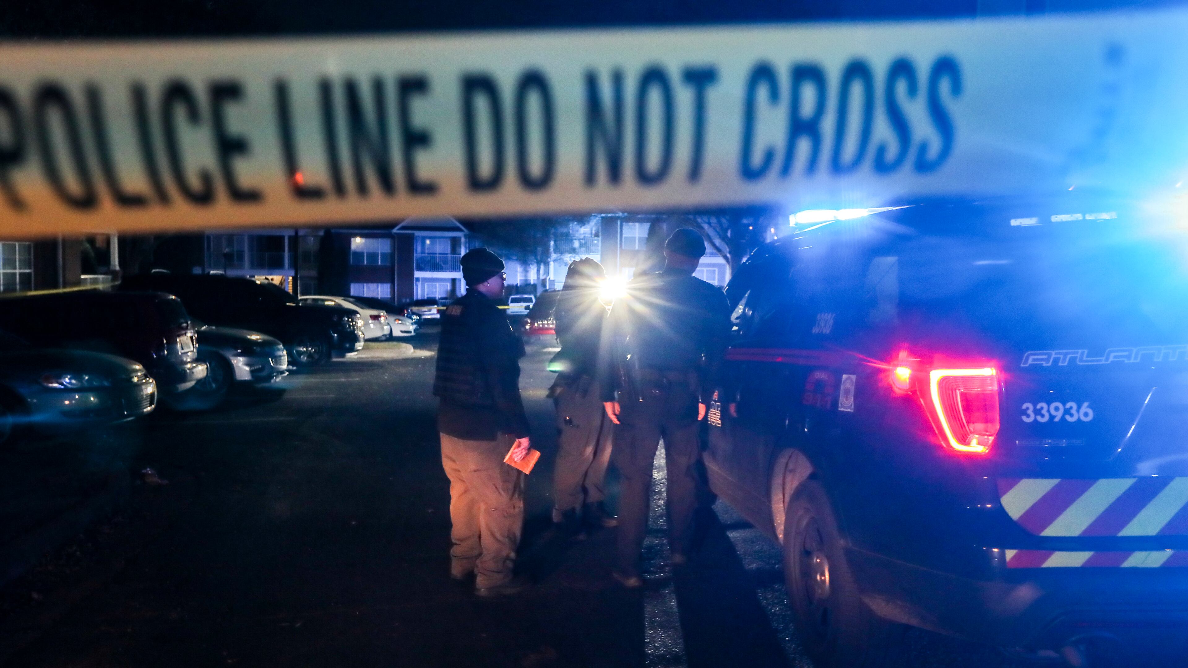 December 2, 2021 Atlanta: Atlanta police were on the scene collecting evidence and photographing a vehicle in the parking lot of The Villages at Carver located at 201 Moury Avenue SW in Atlanta on Thursday, Dec. 2, 2021. A shattered driverÕs window could be seen in the crime scene area. Atlanta police told the Atlanta Journal-Constitution that the scene stemmed from an individual walking into Grady Memorial hospital with a gunshot wound but did not provide any further details. (John Spink / John.Spink@ajc.com)