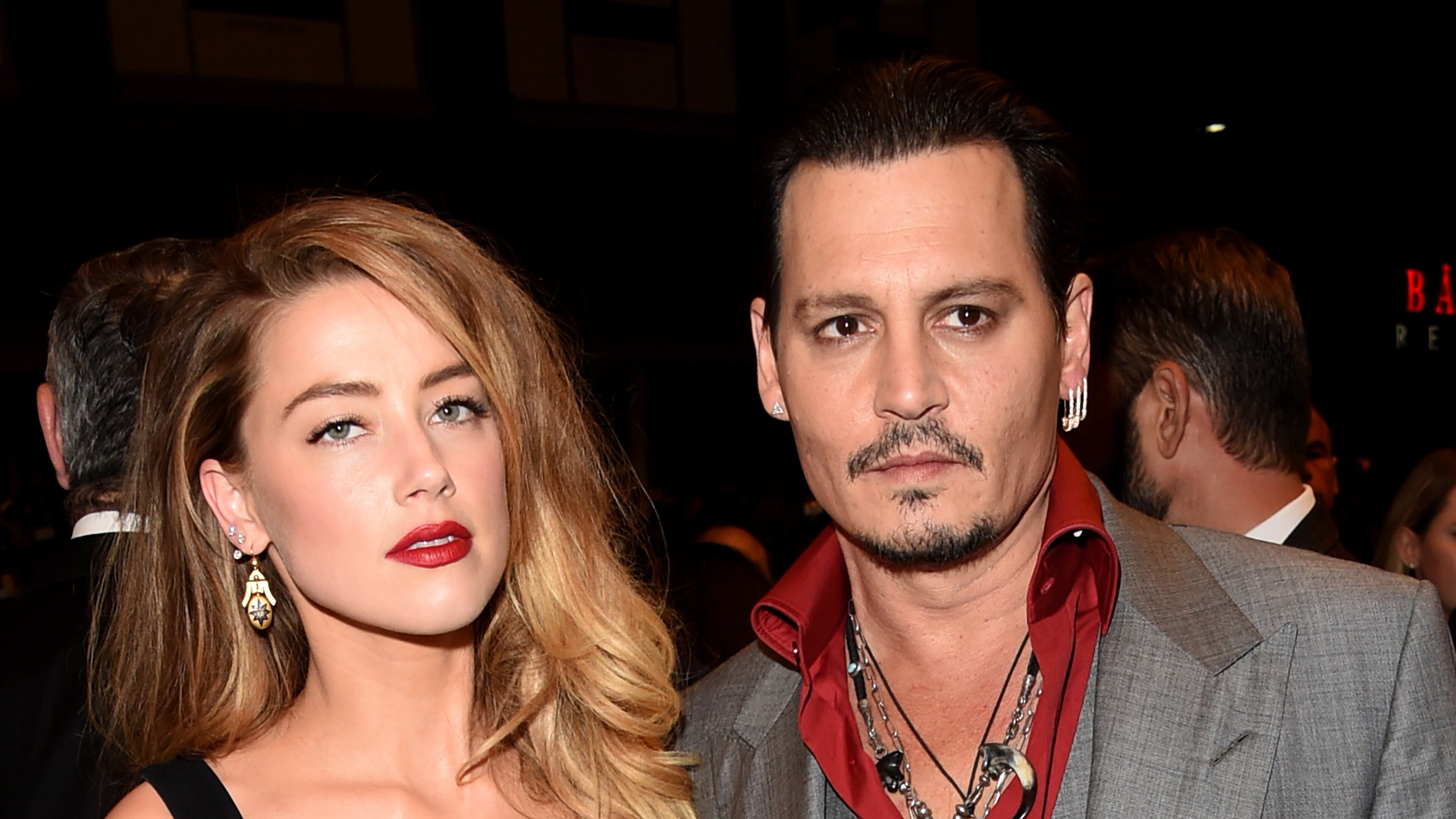 TORONTO, ON - SEPTEMBER 14: Actors Amber Heard (L) and Johnny Depp attend the "Black Mass" premiere during the 2015 Toronto International Film Festival at The Elgin on September 14, 2015 in Toronto, Canada. (Photo by Jason Merritt/Getty Images)