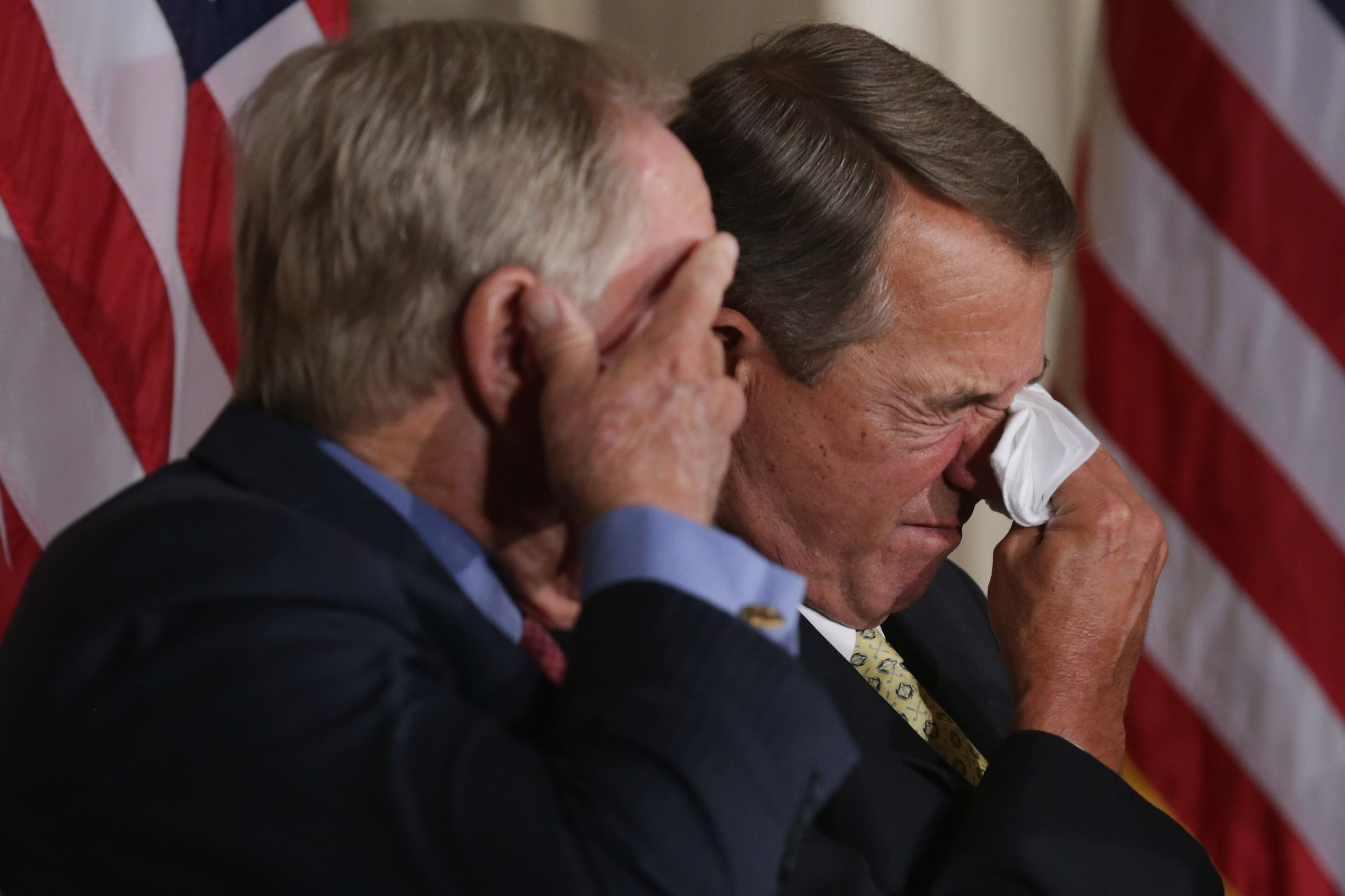 Golf legend Jack Nicklaus (L) and Speaker of the House John Boehner (R-OH) wipe away tears after listening to the remarks of Nicklaus' son Jack Nicklaus II during the elder Nicklaus' Congressional Gold Medal a ceremony in the U.S. Capitol Rotunda March 24, 2015 in Washington, DC. Nicklaus was lauded by family, friends and politicians for his many sports achievements and his philanthropy. Last month Nicklaus his wife, Barbara, pledged $60 million for the Miami Children's Health System through their Nicklaus Children's Health Care Foundation.