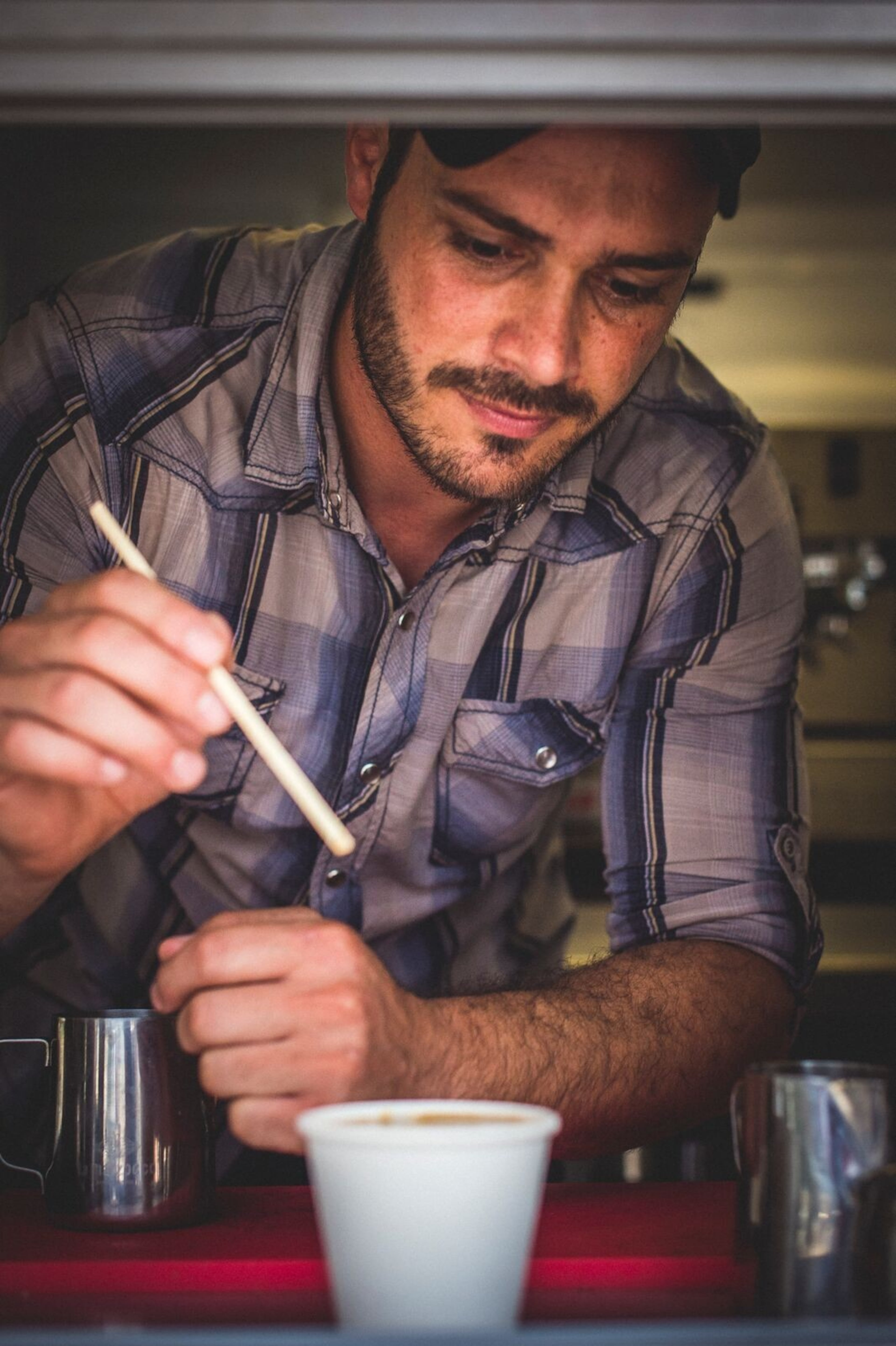 Refuge Coffee in Clarkston is a welcoming place for refugees to relax and meet with friends. Refuge helps provide job training and mentoring to resettled refugees and other immigrants. (Photo by Sean Sheridan)