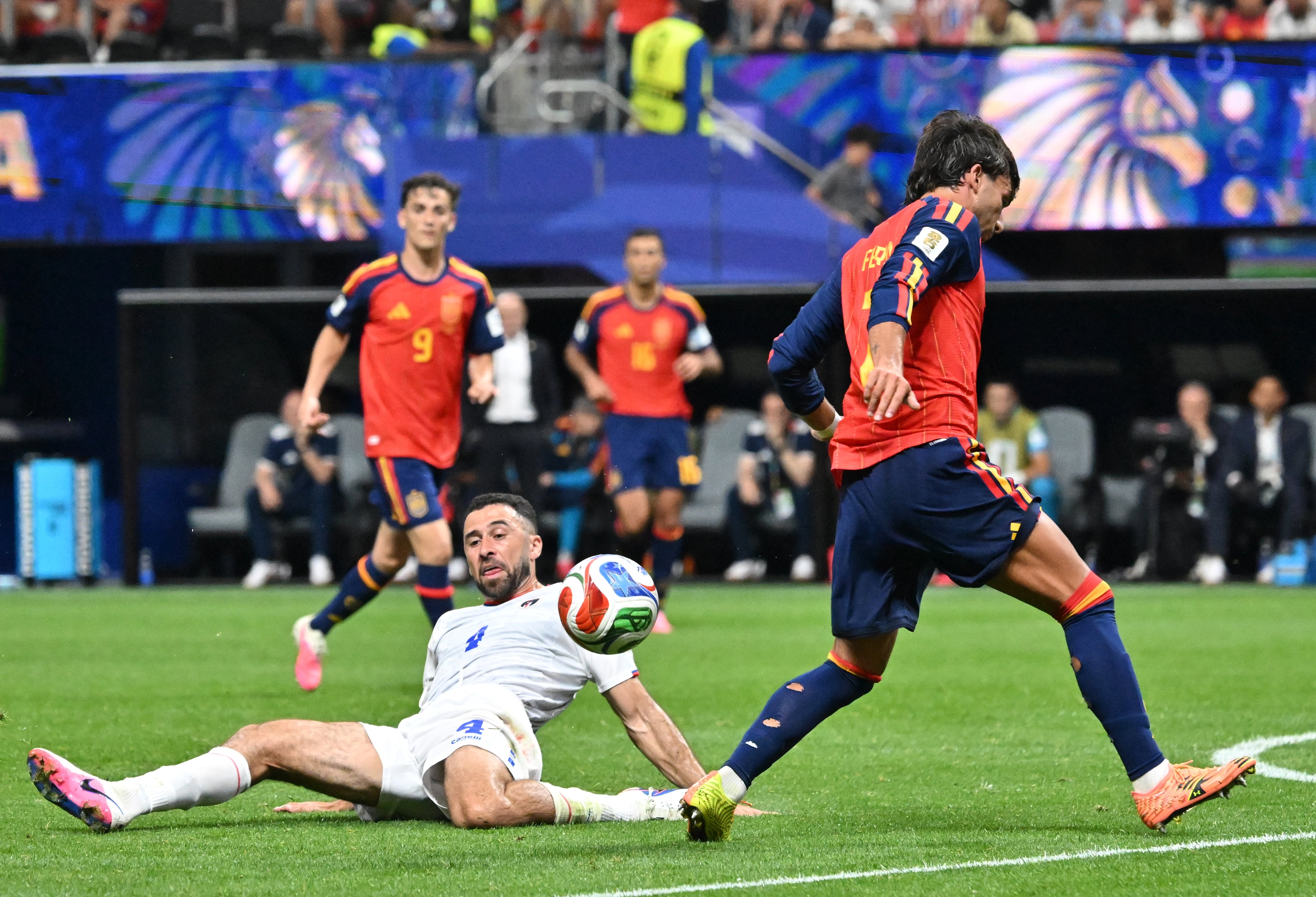 Cape Verde's Pico Lopes (4) and Spain's Ferran Torres (7) fight for ball during second half of Spain vs. Cape Verde Group H match at Atlanta Stadium (Mercedes-Benz Stadium) on Monday, June 15, 2026. (Hyosub Shin/AJC)
