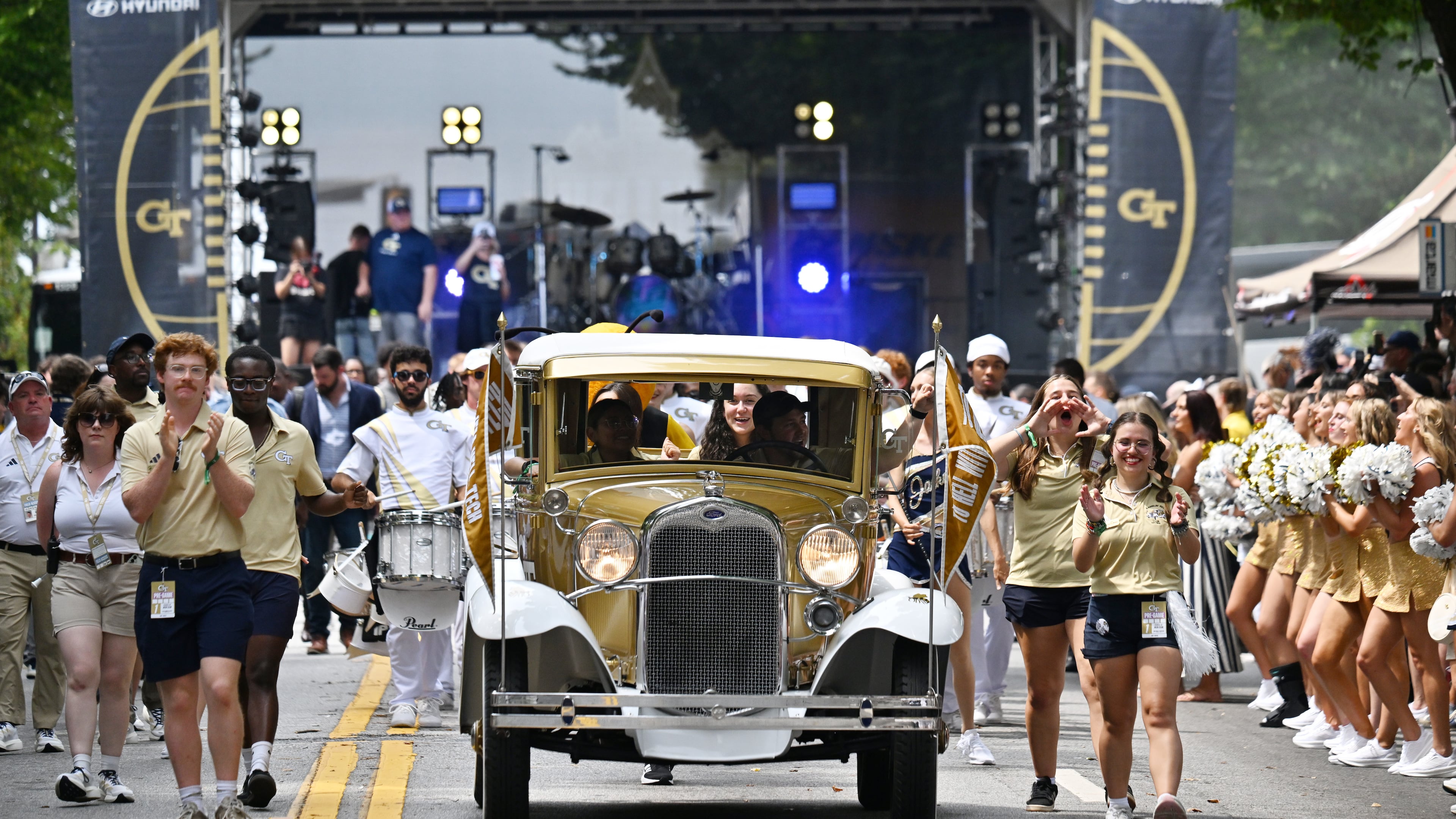 Georgia Tech's Ramblin' Wreck leads the band, cheerleaders, Buzz, players, and coaches before the start of the Georgia Tech home opener against Gardner-Webb at Georgia Tech's Bobby Dodd Stadium, Saturday, November 6, 2025 in Atlanta. (Hyosub Shin/AJC)