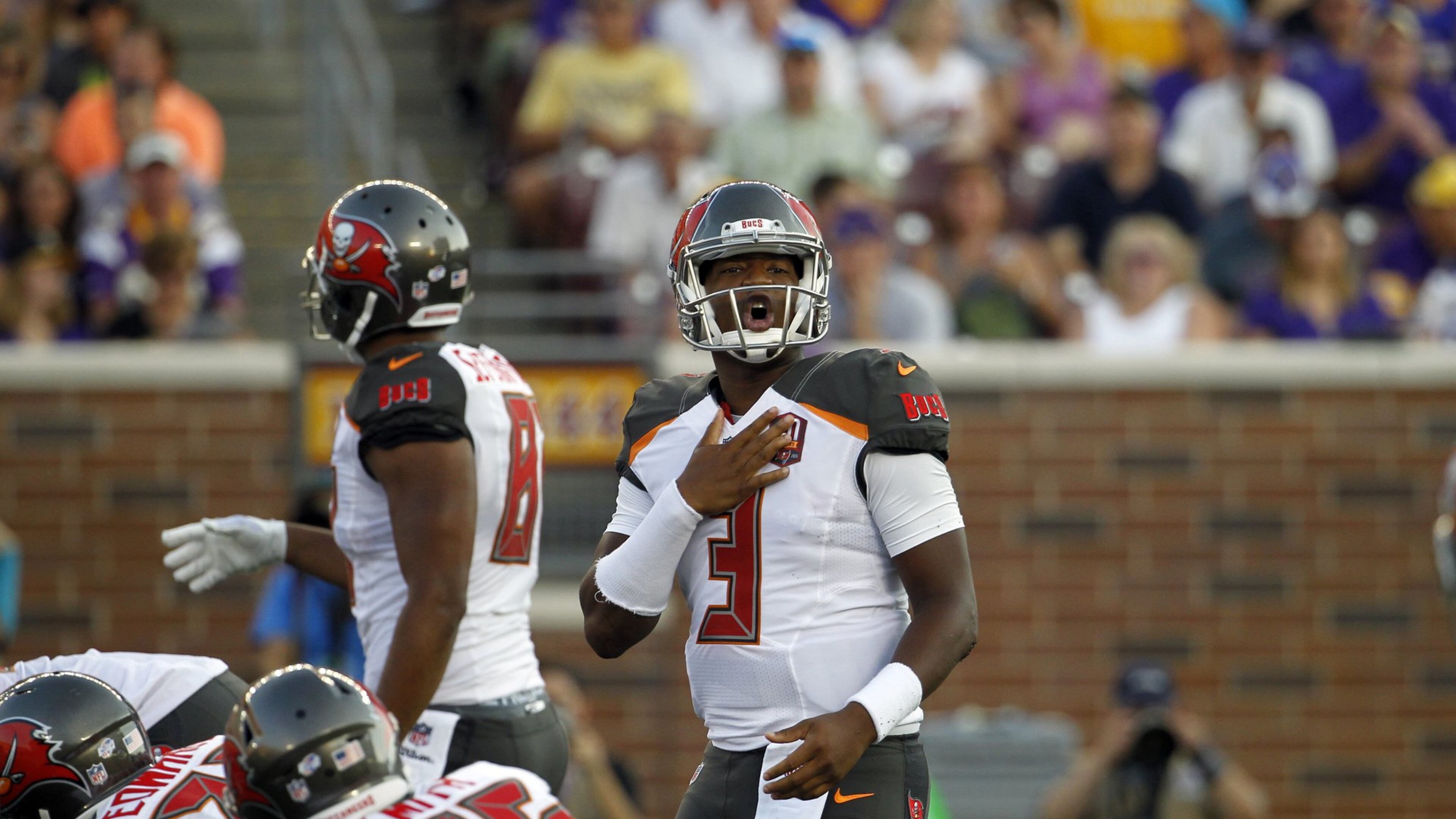 Tampa Bay Buccaneers quarterback Jameis Winston (3) signals at the line of scrimmage against the Minnesota Vikings during the first half of a preseason NFL football game at TCF Bank Stadium Saturday, Aug. 15, 2015, in Minneapolis. (AP Photo/Ann Heisenfelt)