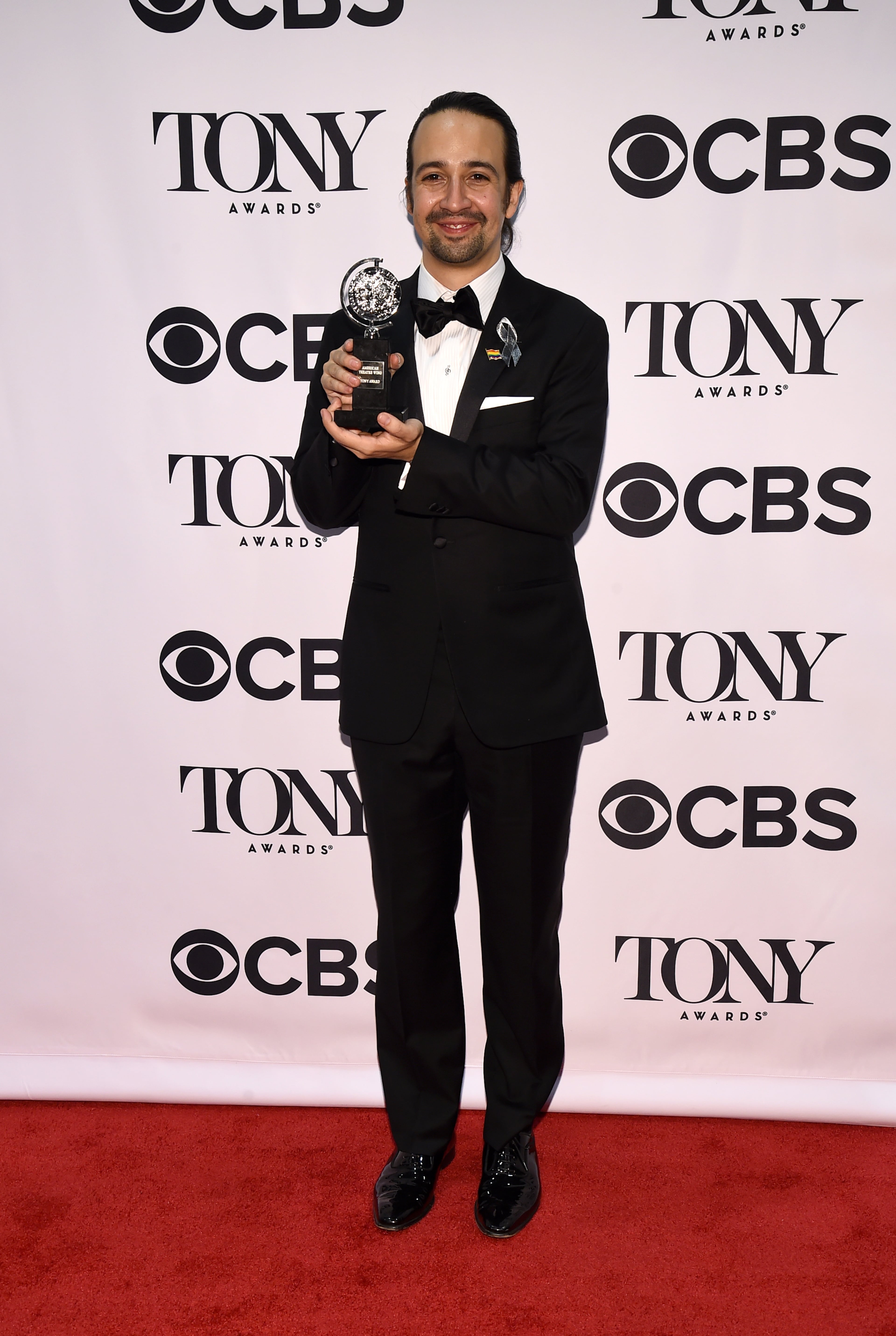 Lin-Manuel Miranda poses in the press room with the award for best musical at the Tony Awards on Sunday, June 12, 2016, in New York. (Photo by Charles Sykes/Invision/AP)
