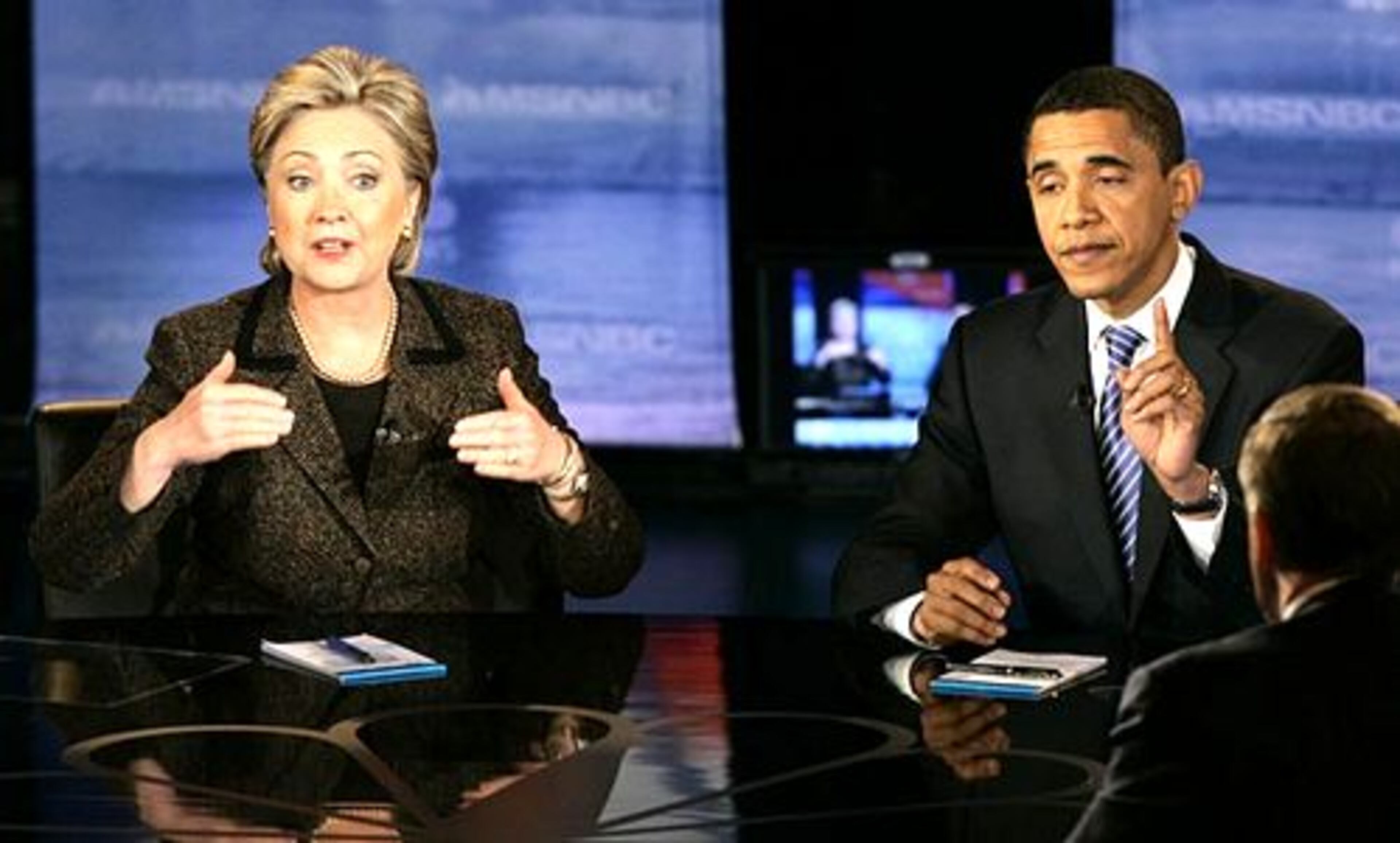 Hillary Clinton said that as far as she knew, her campaign had nothing to do with circulating a photograph of Barack Obama wearing a white turban and a wraparound white robe.