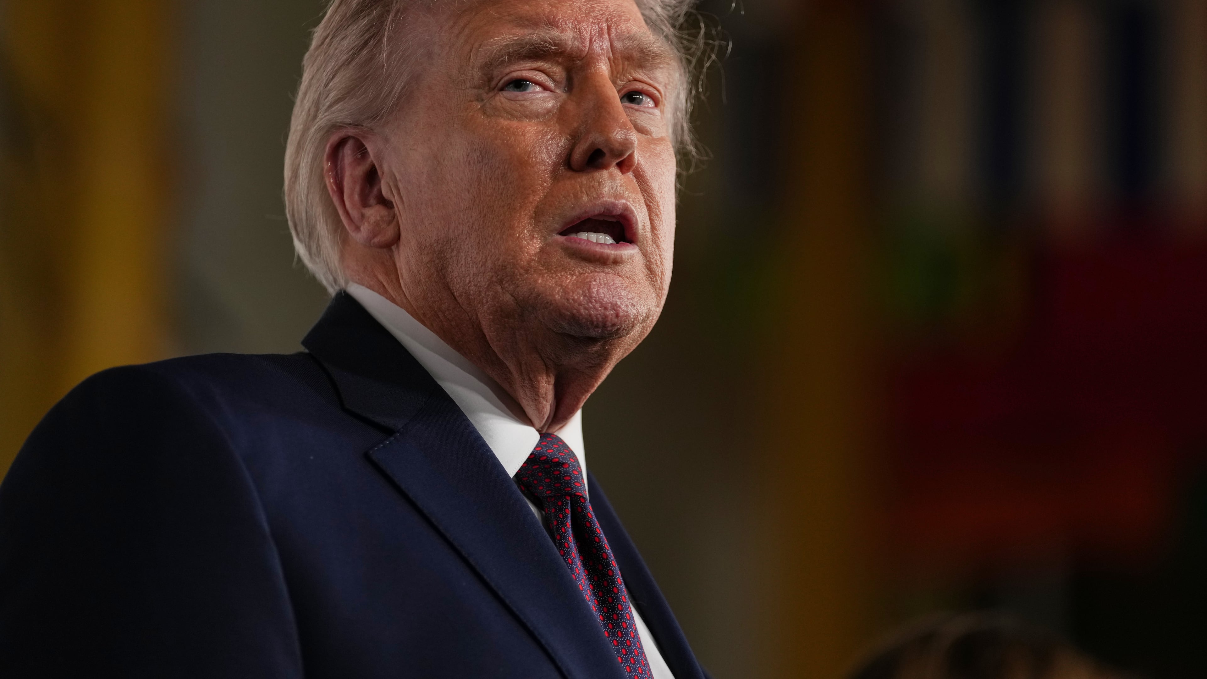 President Donald Trump arrives for the premiere of first lady Melania Trump's movie "Melania" at The John F. Kennedy Memorial Center For The Performing Arts, Thursday, Jan. 29, 2026, in Washington. (AP Photo/Allison Robbert)