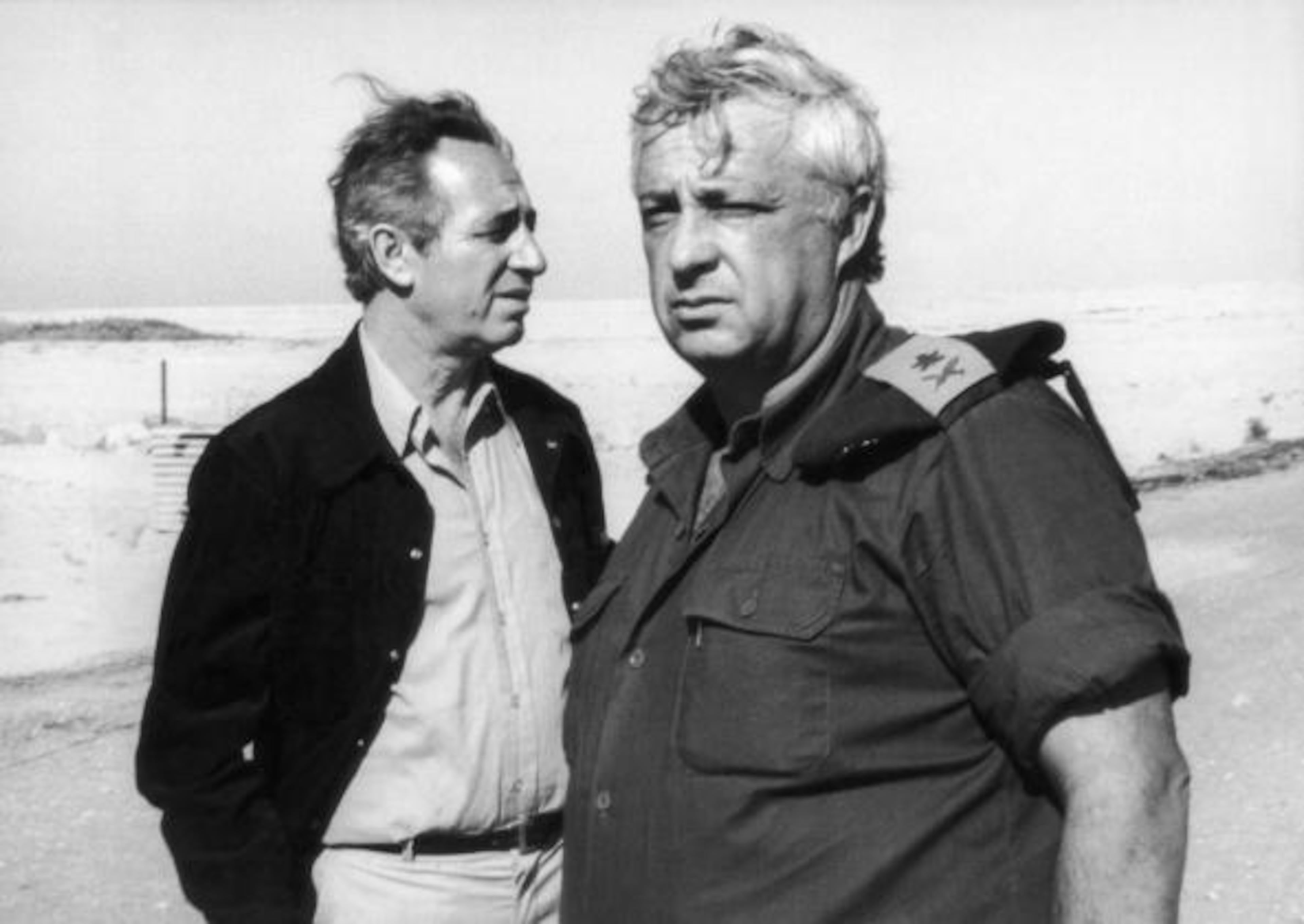 Israeli politicians Shimon Peres (left) and Ariel Sharon visit Ras-Sudar in Egypt, 1975. This was an important location in the Six Day War of 1967. (Photo by Hulton Archive/Getty Images)