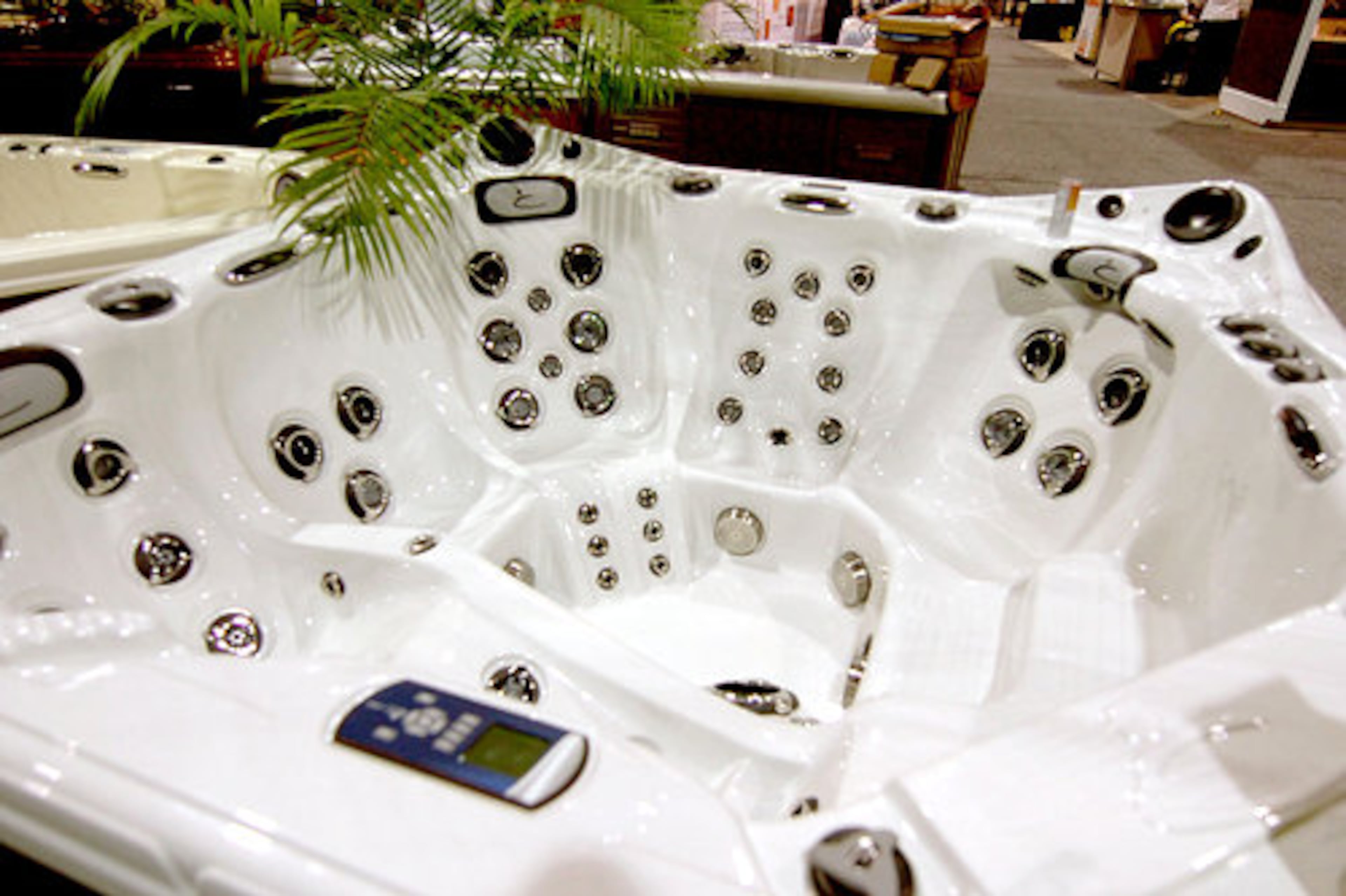 A huge spa shows some of the latest features from Dynasty Spas of Atlanta