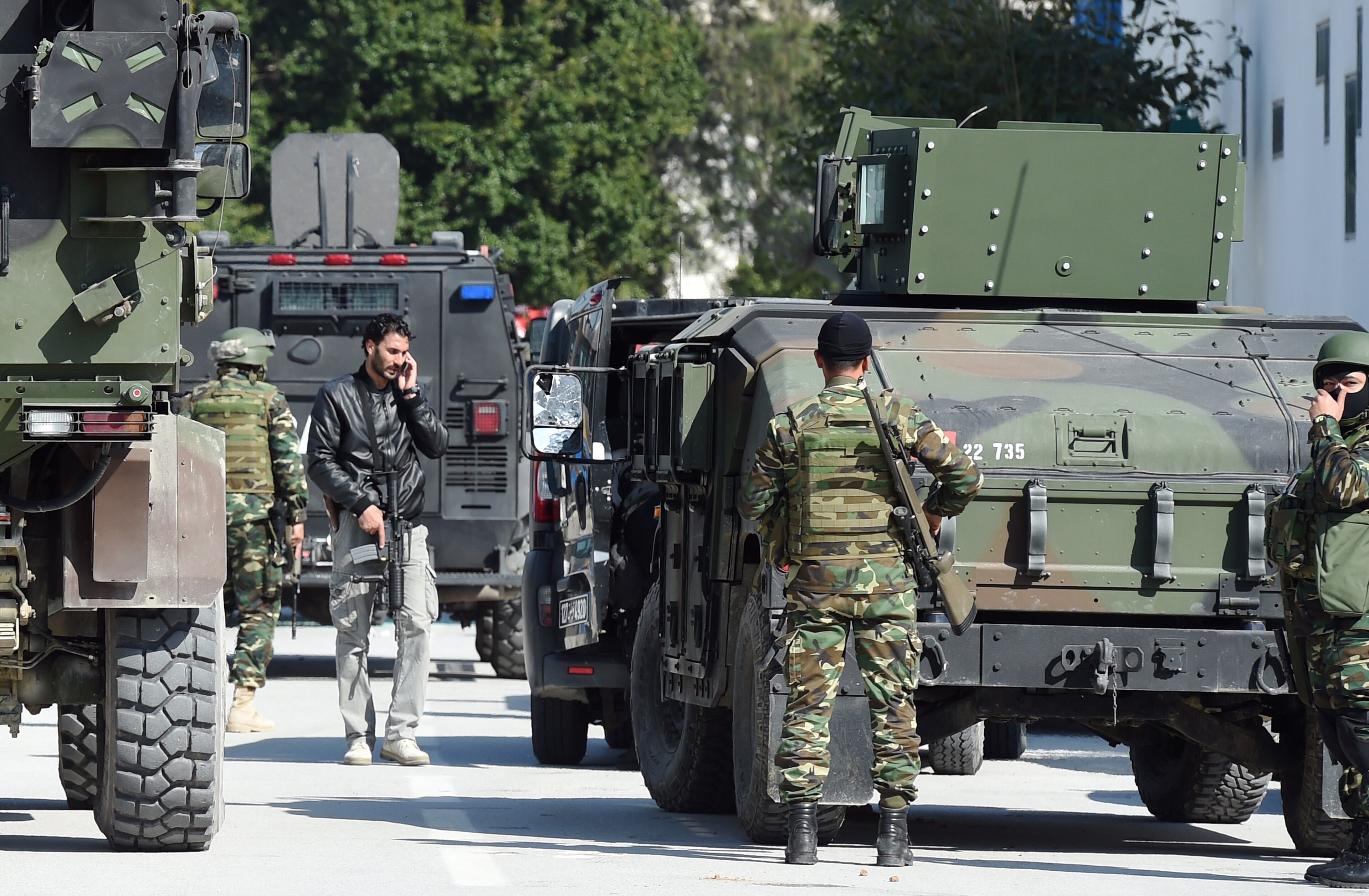 Tunisian security forces and military personnel secure the area after gunmen attacked Tunis' famed Bardo Museum on March 18, 2015. At least seven foreigners and a Tunisian were killed in an attack by two men armed with assault rifles on the museum, the interior ministry said. AFP PHOTO / FETHI BELAID (Photo credit should read FETHI BELAID/AFP/Getty Images)