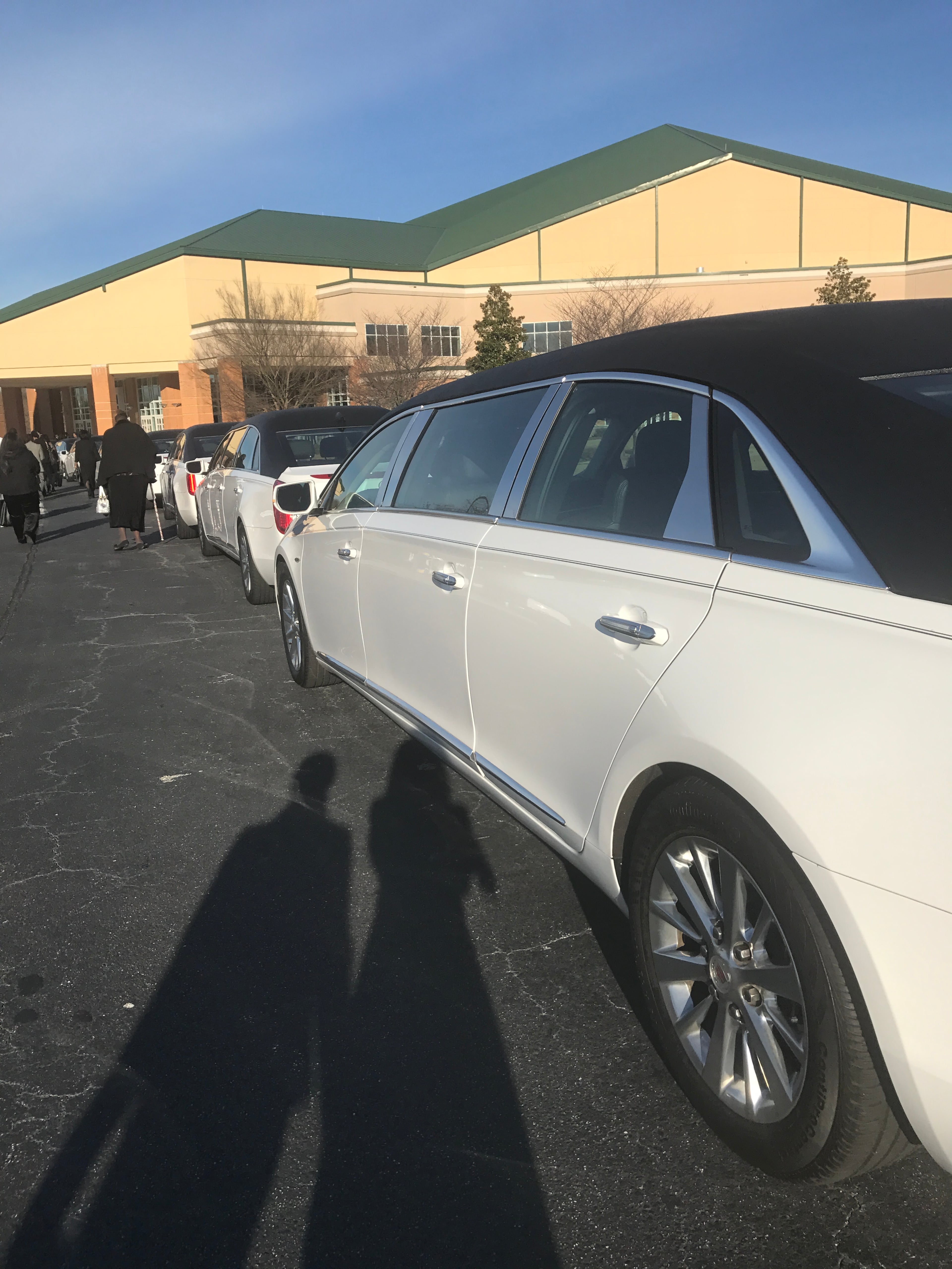 Family members arrive at Eddie Long's funeral.