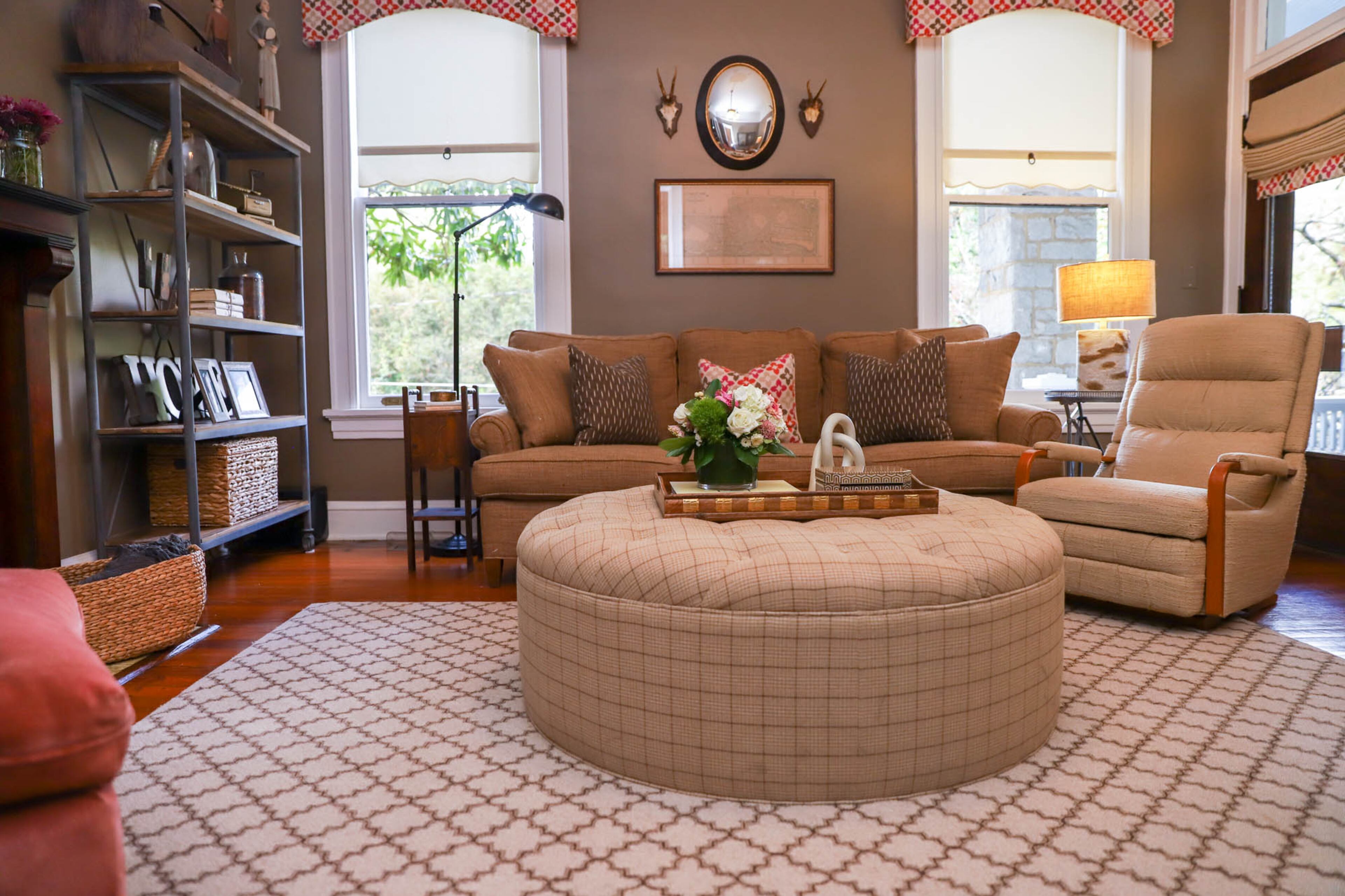 The home's eclectic interiors include a variety of textures and patterned fabrics from Thibaut with the foundation of a neutral palette. The walls are painted Sherwin-Williams' Warm Stone.