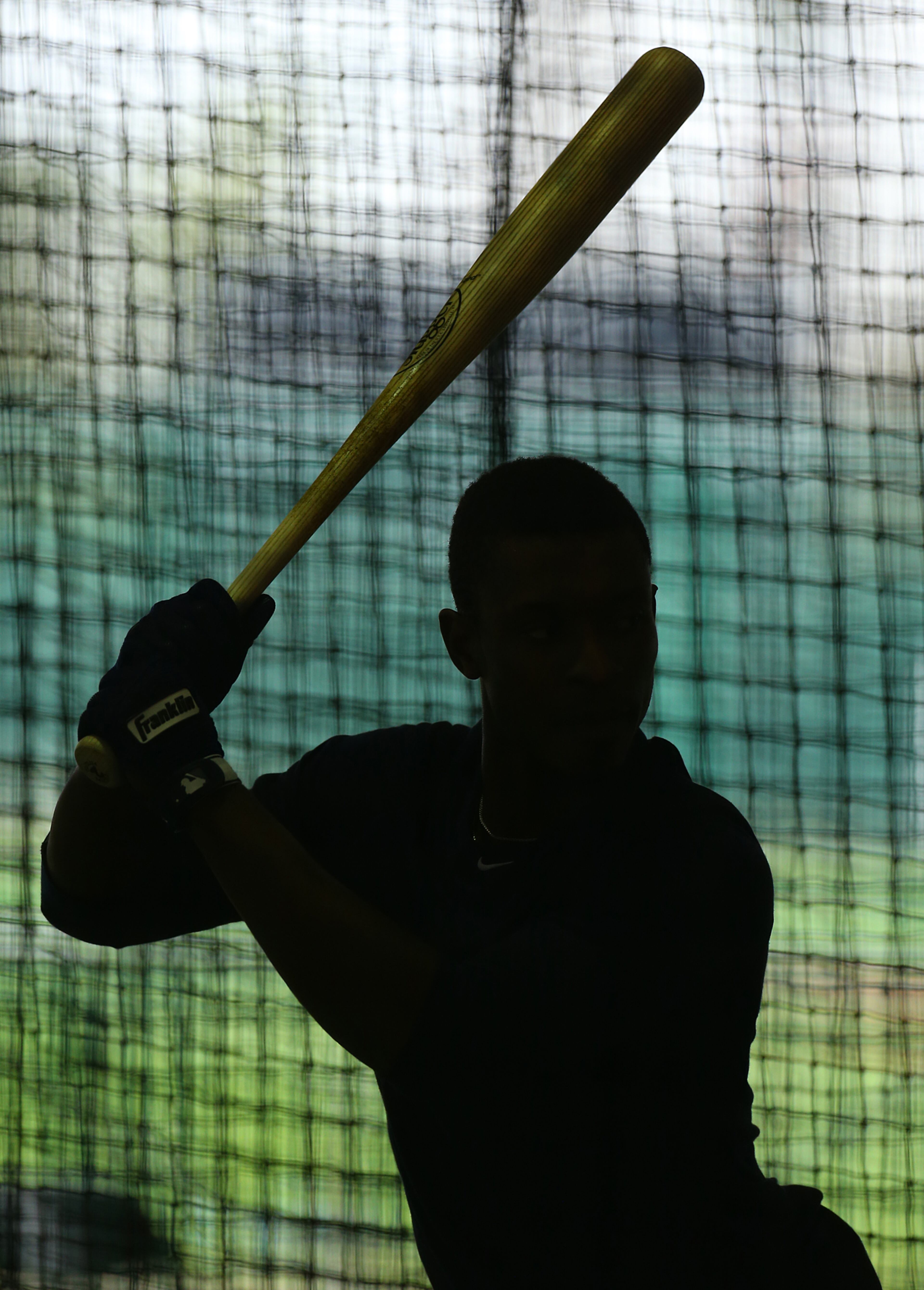 Outfielder B.J. Upton works in the Braves' batting tunnel.