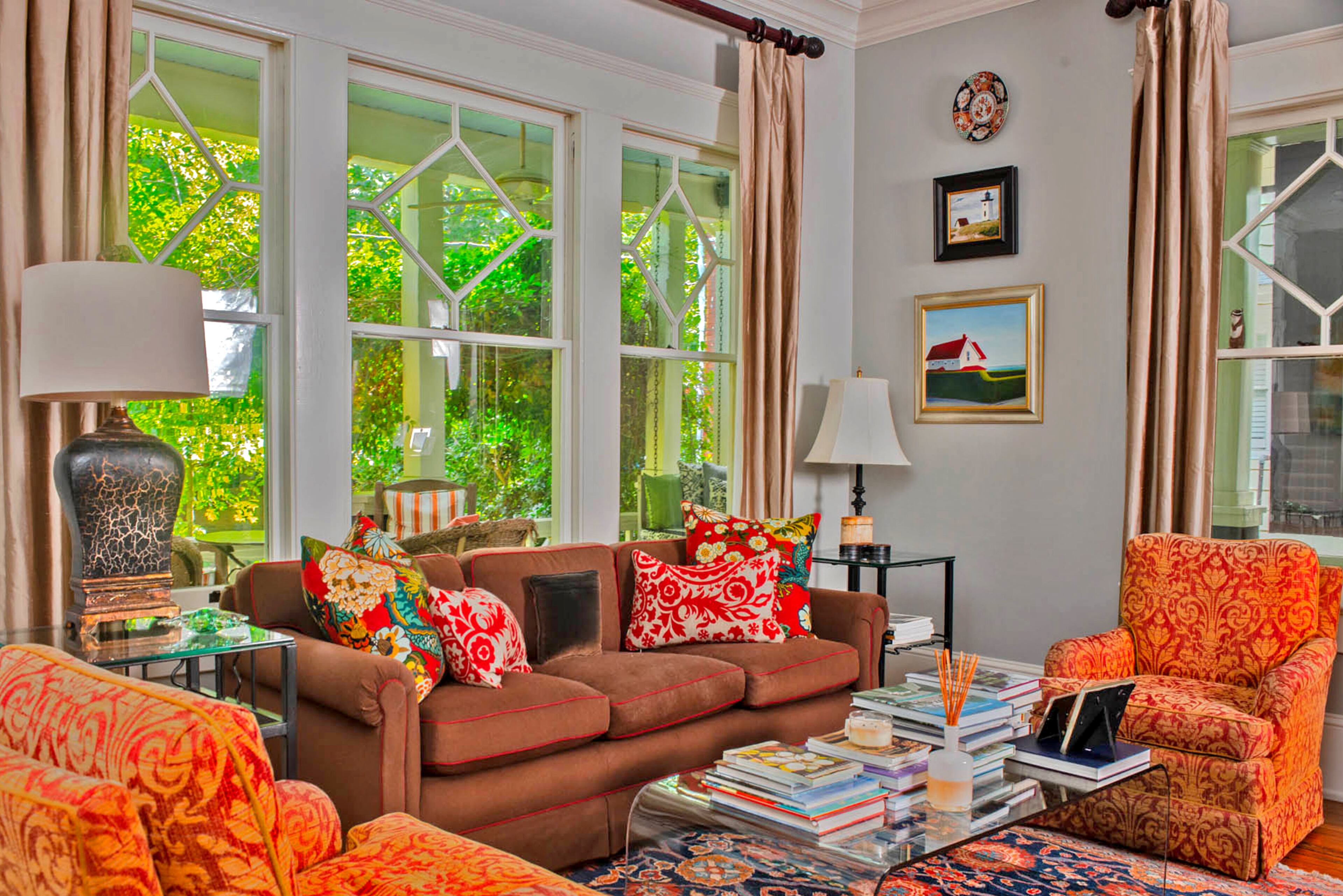 The living room's palette of primary colors was built around the rug, said homeowner Charlie Lefort. While most of the furniture in the home is traditional, a more contemporary item is the glass coffee table, from now-closed Storehouse in Buckhead.