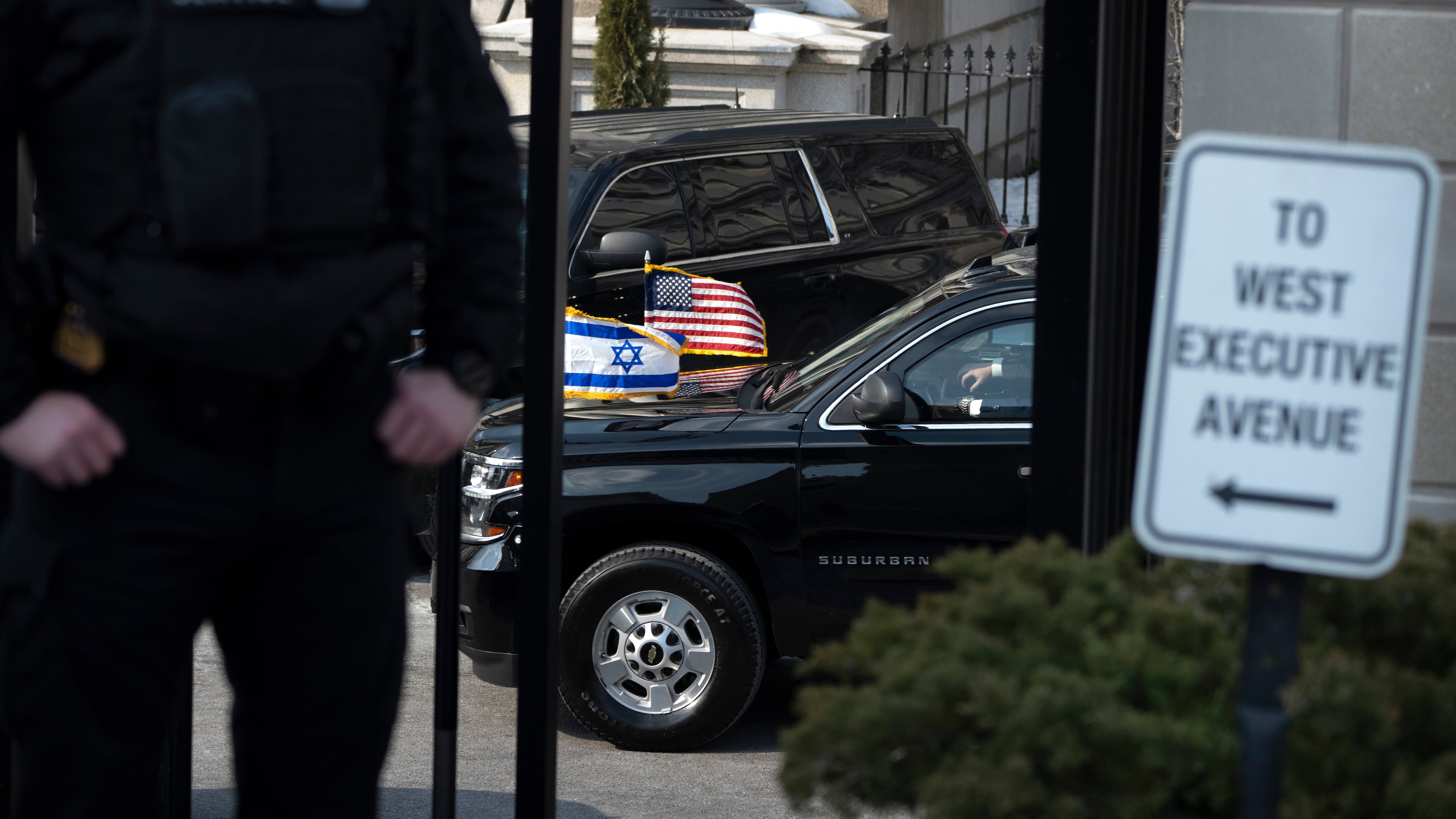 A vehicle carrying Israeli Prime Minister Benjamin Netanyahu arrives at the White House Wednesday, Feb. 11, 2026, in Washington. (AP Photo/Mark Schiefelbein)