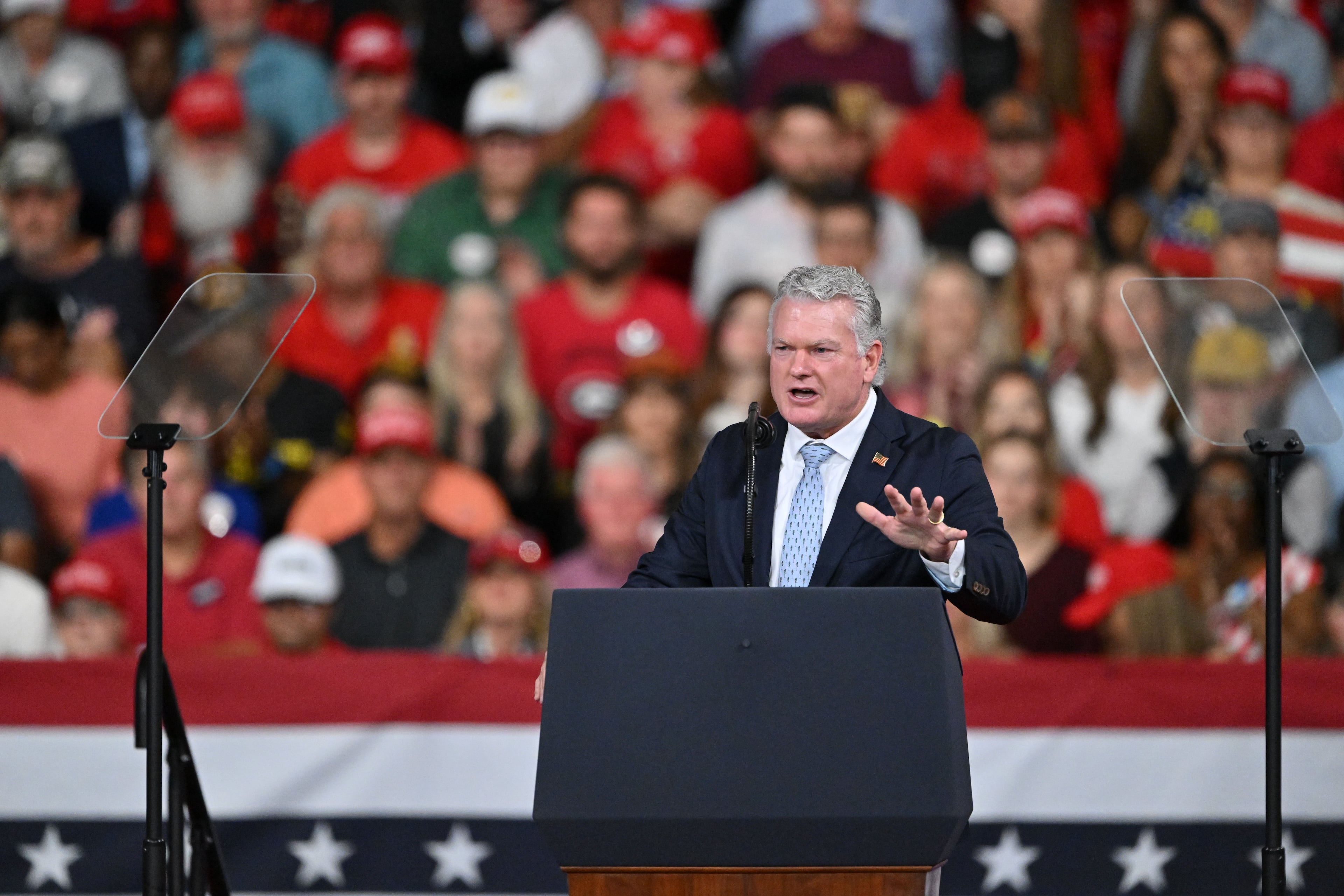 Georgia Republican U.S. Senate nominee Mike Collins speaks before President Donald Trump arrives at a midterm campaign rally at Guardian Centers in Perry on Saturday, Oct. 24, 2026. (Hyosub Shin/AJC)