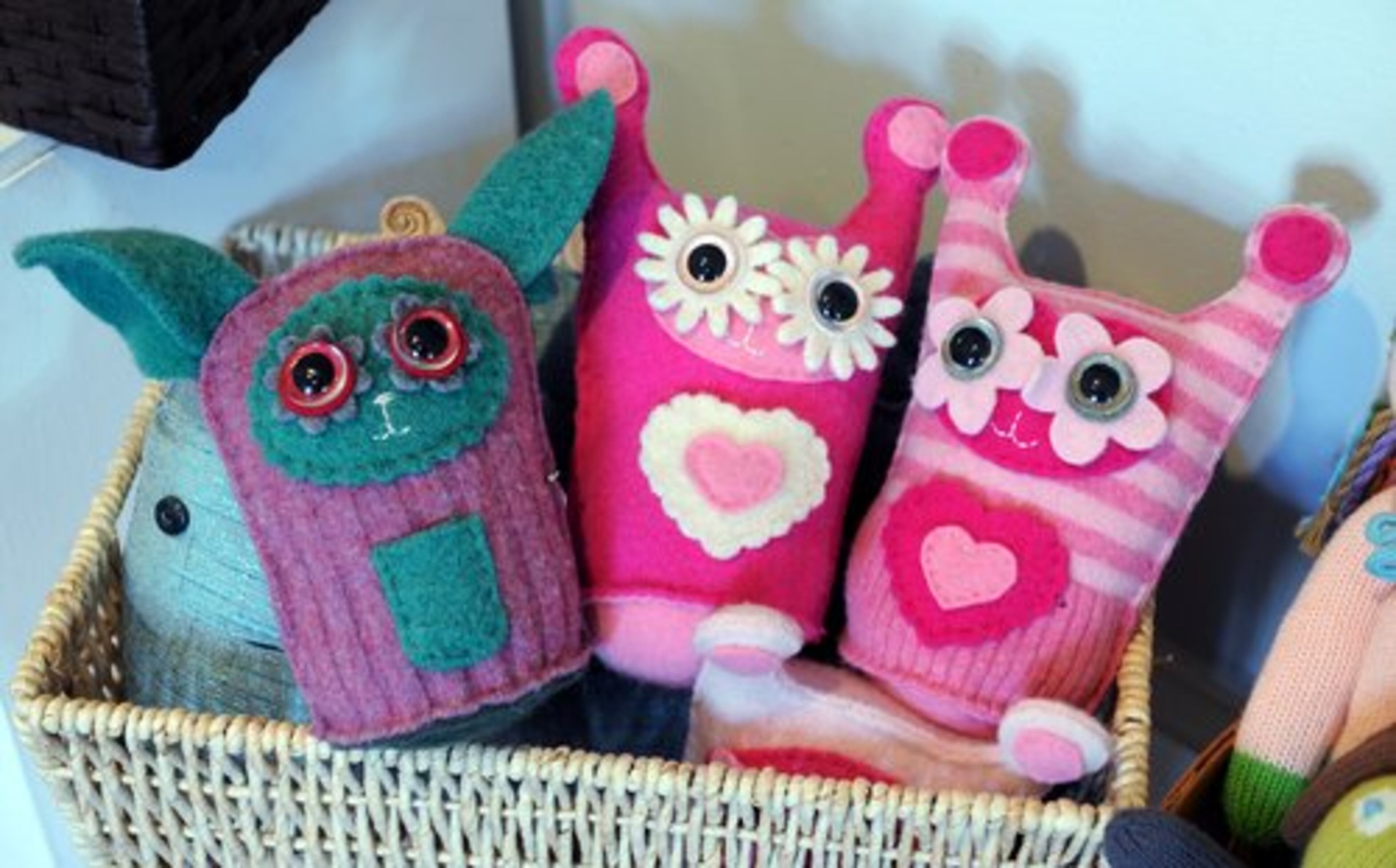 Stuffed felt animals, or "Sneaters, " from $24.95 to $32.95, by artist Colleen Casey at the Holiday Artists Market at the Spruill Center for the Arts in Dunwoody.