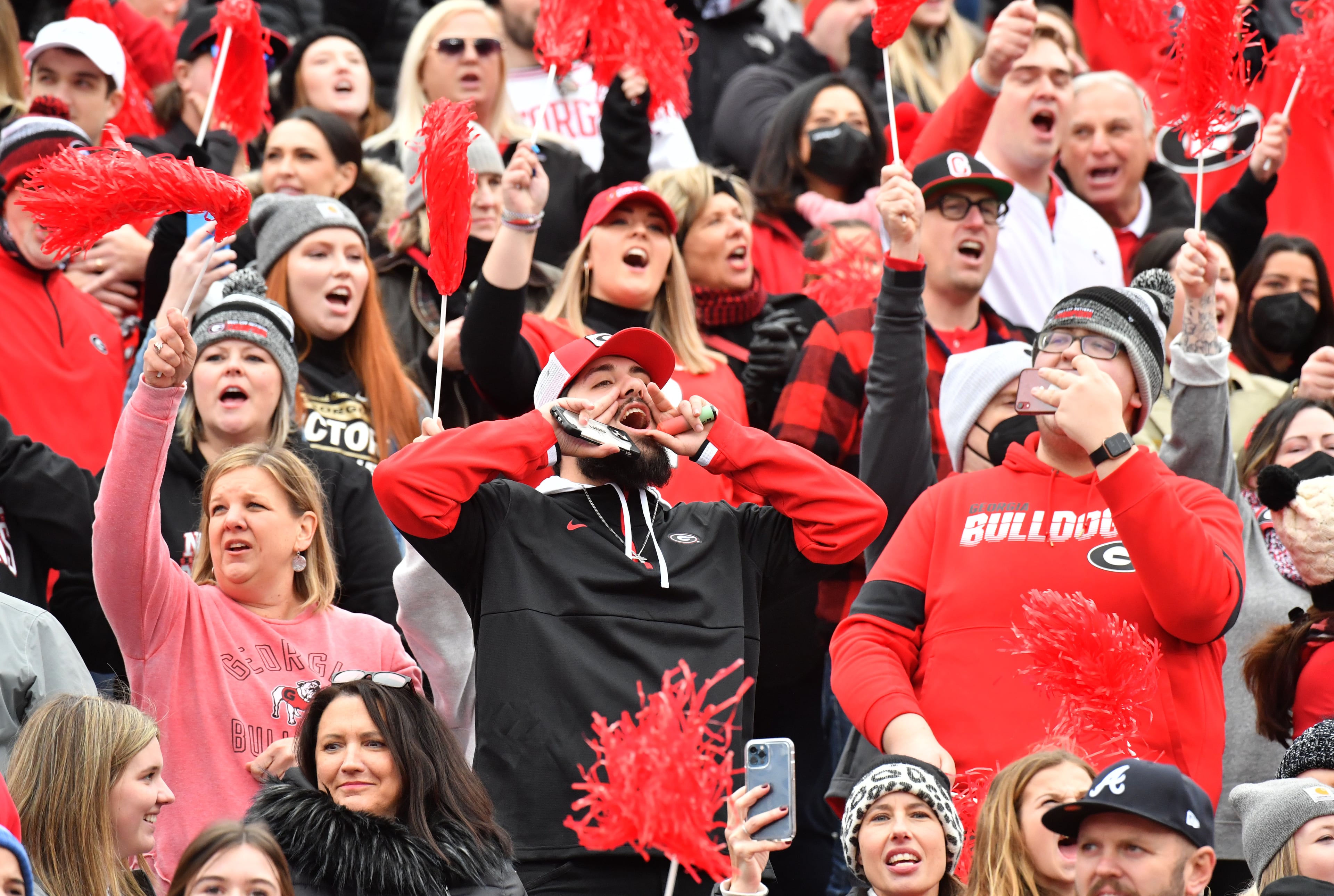 January 15, 2022 Athens - Georgia fans cheer as players take on the stage during the celebration of Georgia’s College Football Playoff national championship at Sanford Stadium in Athens on Saturday, January 15, 2022. Georgia captured the national championship, its first since the 1980 season, with a 33-18 victory over Alabama at Lucas Oil Stadium in Indianapolis. (Hyosub Shin / Hyosub.Shin@ajc.com)