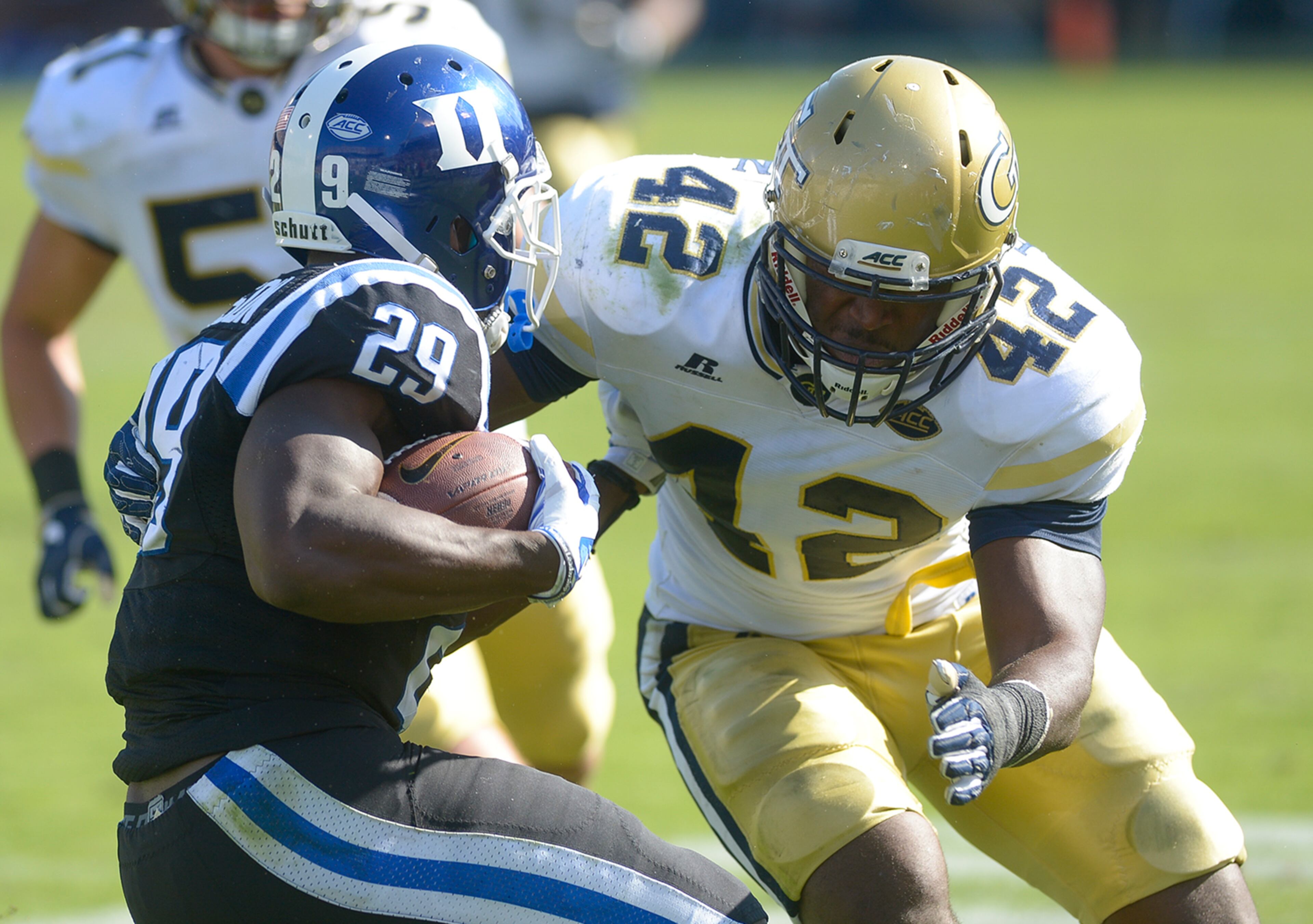Atlanta, Ga. -- Georgia Tech junior DE KeShun Freeman (42) closes in on Duke junior RB Shaun Wilson (29) as he runs the ball in the second half of the football game at Bobby Dodd Stadium Saturday, October 29, 2016. SPECIAL/Daniel Varnado