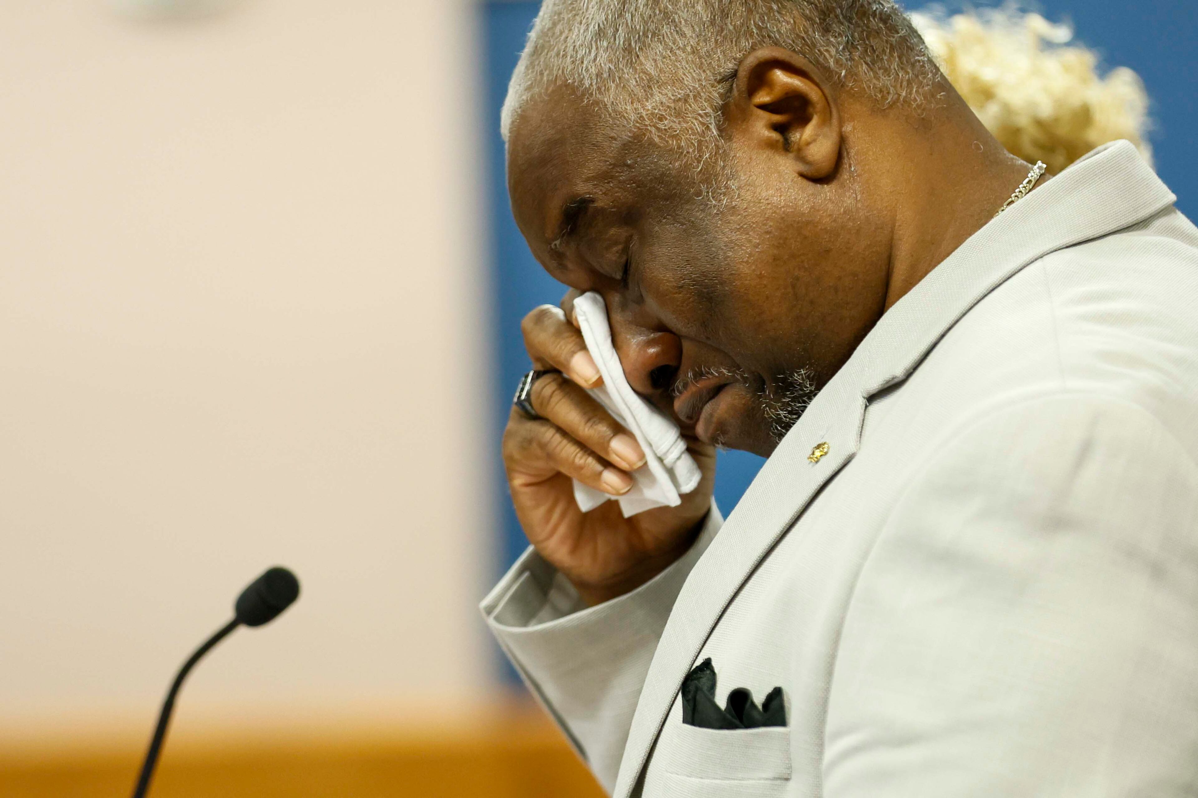 Reginald Folks Sr., father of the late Reginald Folks, wipes away tears as he speaks to Fulton County Superior Court Judge Scott McAfee on Tuesday during the sentencing of former APD officer Koby Minor, who killed his son in May 2024. (Miguel Martinez / AJC)